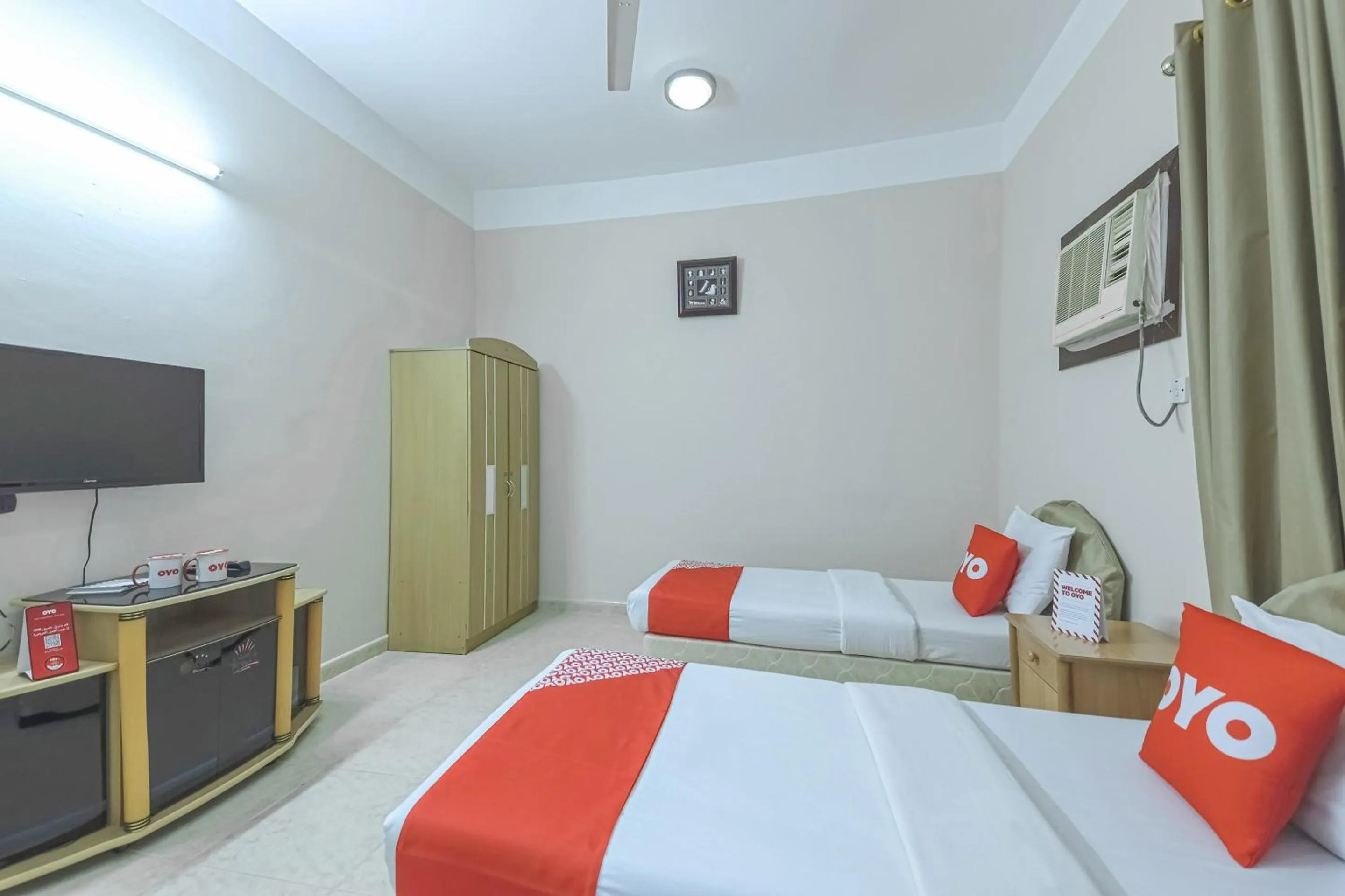 Bedroom in Super OYO 108 Marsa Al Masafar Hotel Apartment