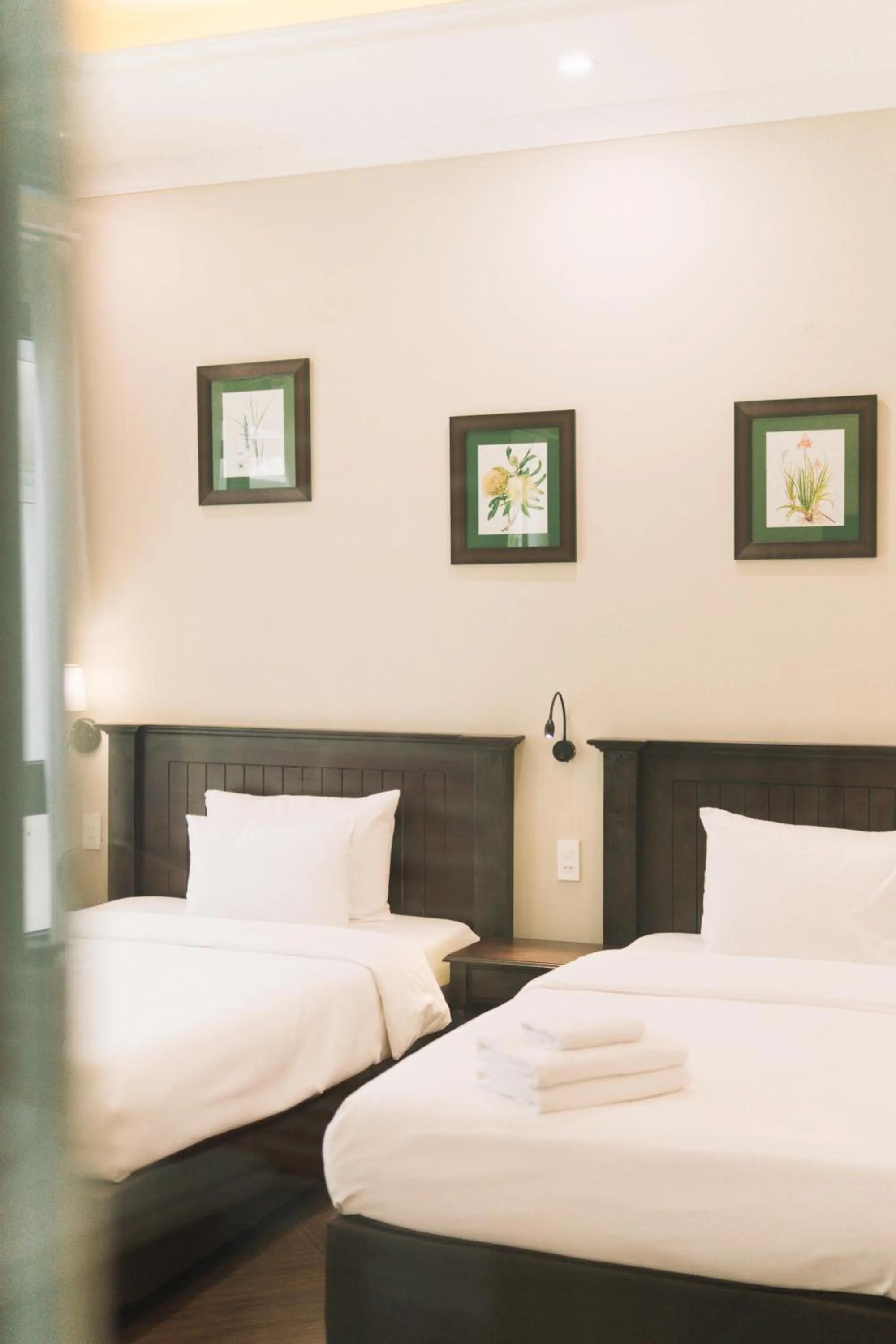 Bed in N Queen Apartment Hotel