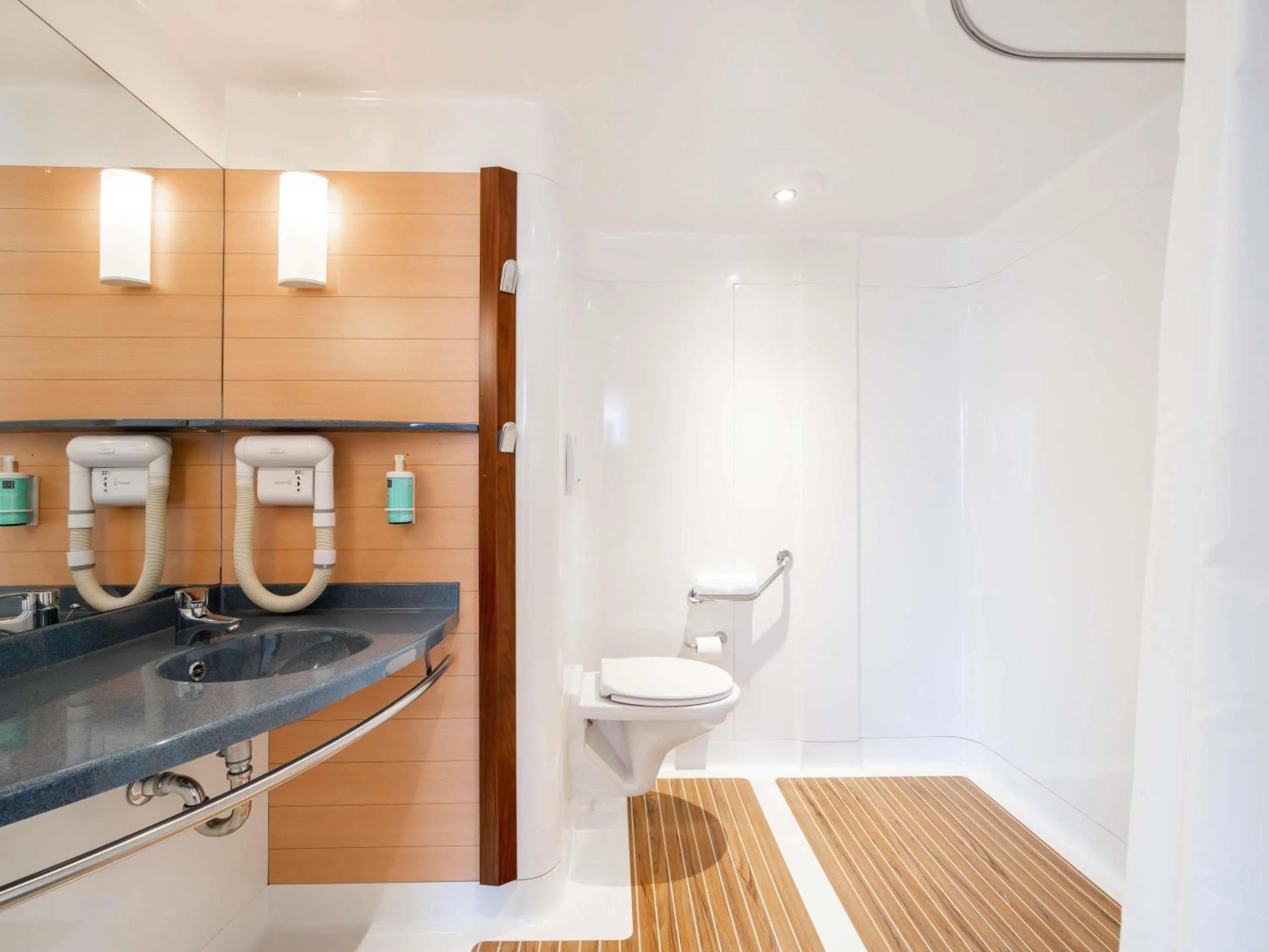 Bedroom in Novotel Suites Cannes Centre