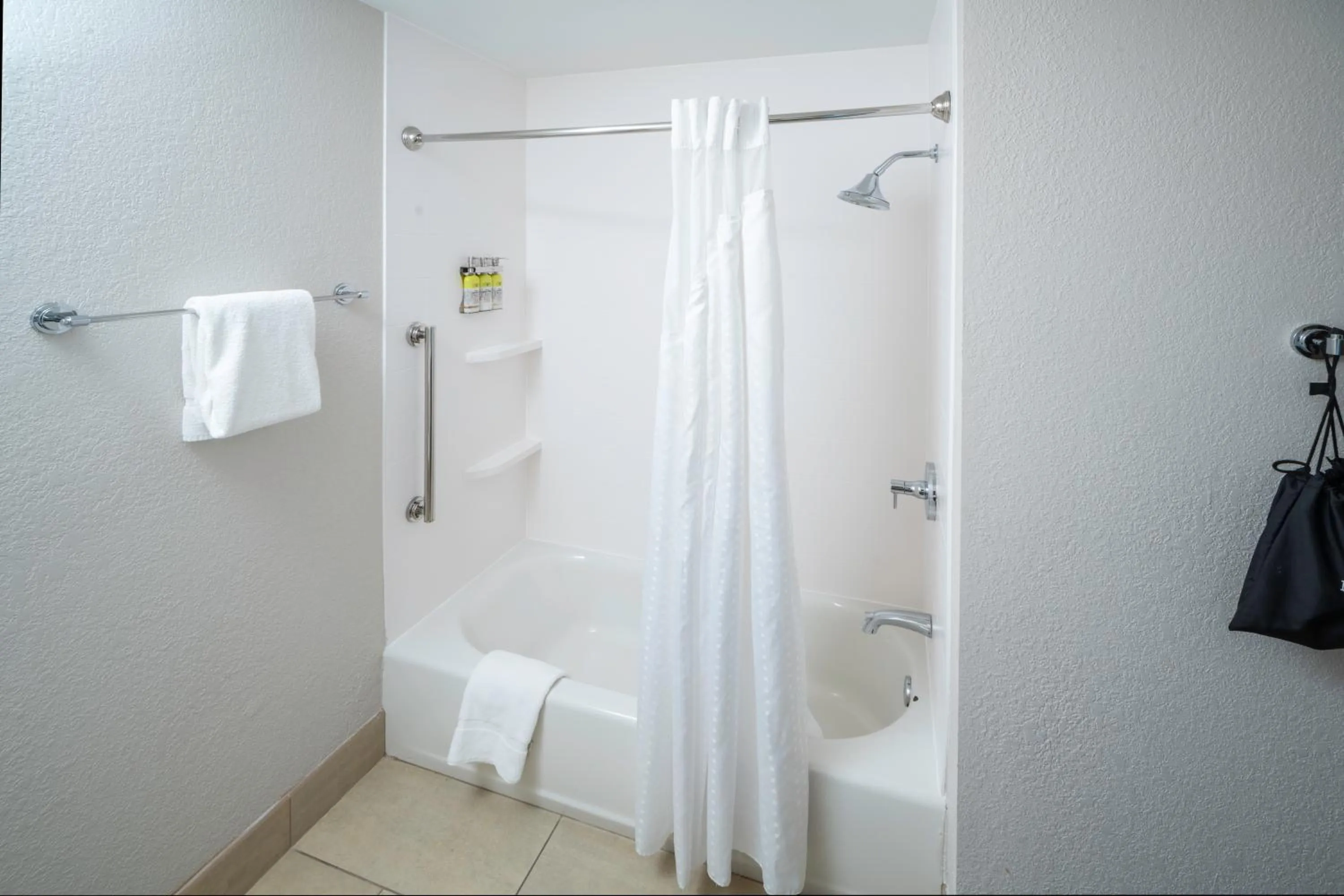 Bathroom in Holiday Inn Express & Suites - Florence - Cincinnati Airport by IHG