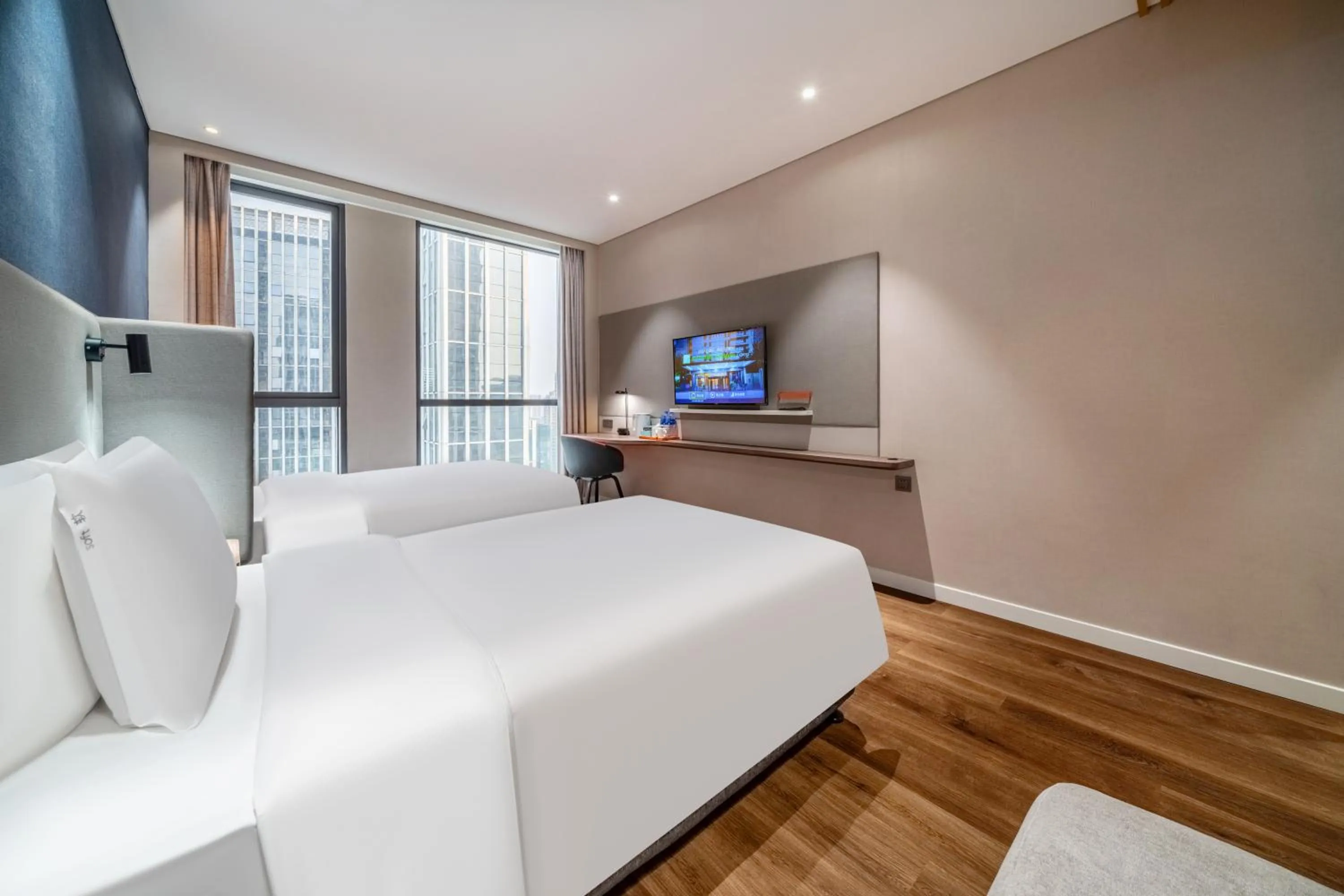 Bed in Holiday Inn Express Hangzhou Binjiang Aoti by IHG