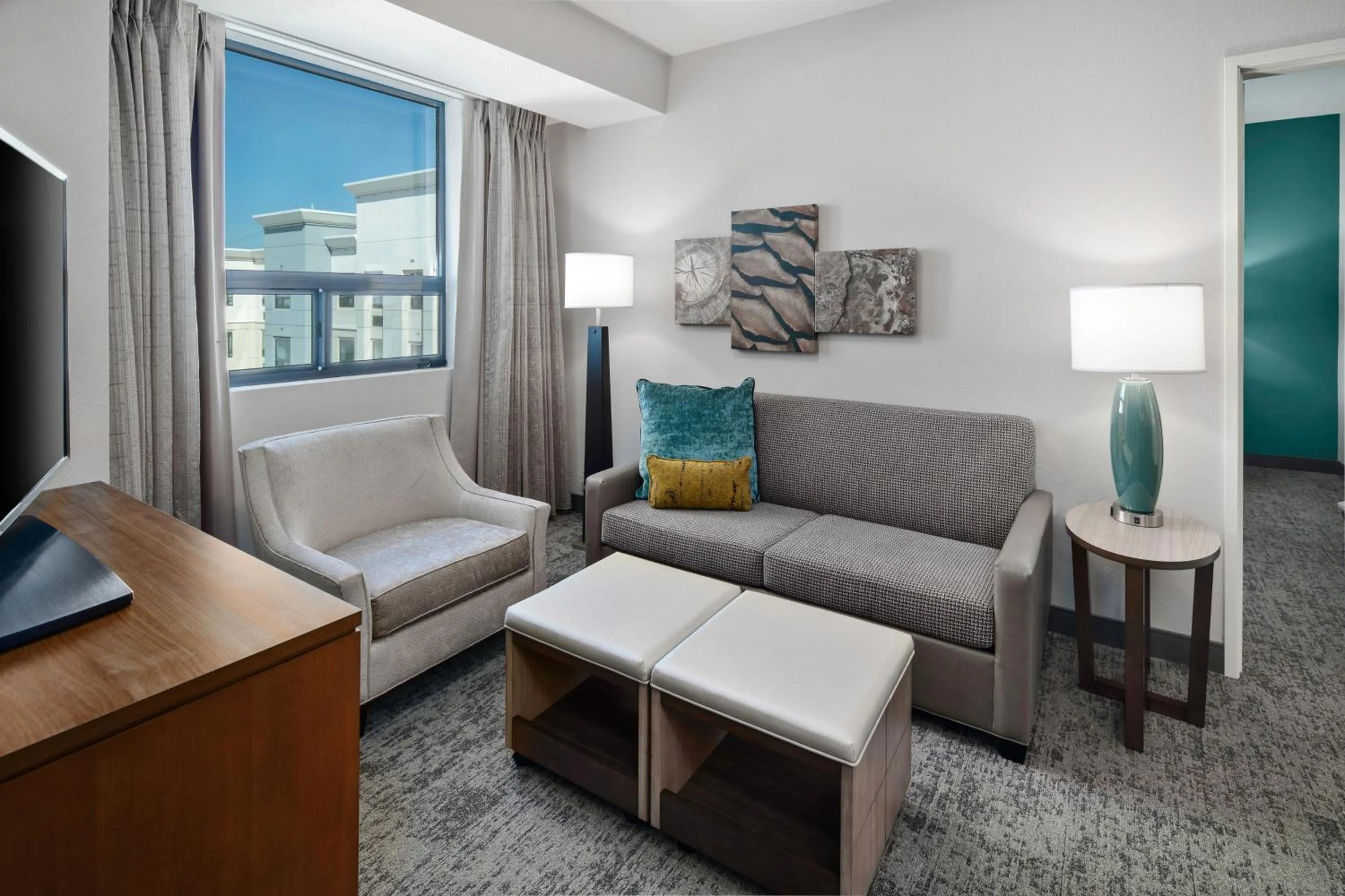 Living room, Bed in Staybridge Suites Irvine - John Wayne Airport by IHG