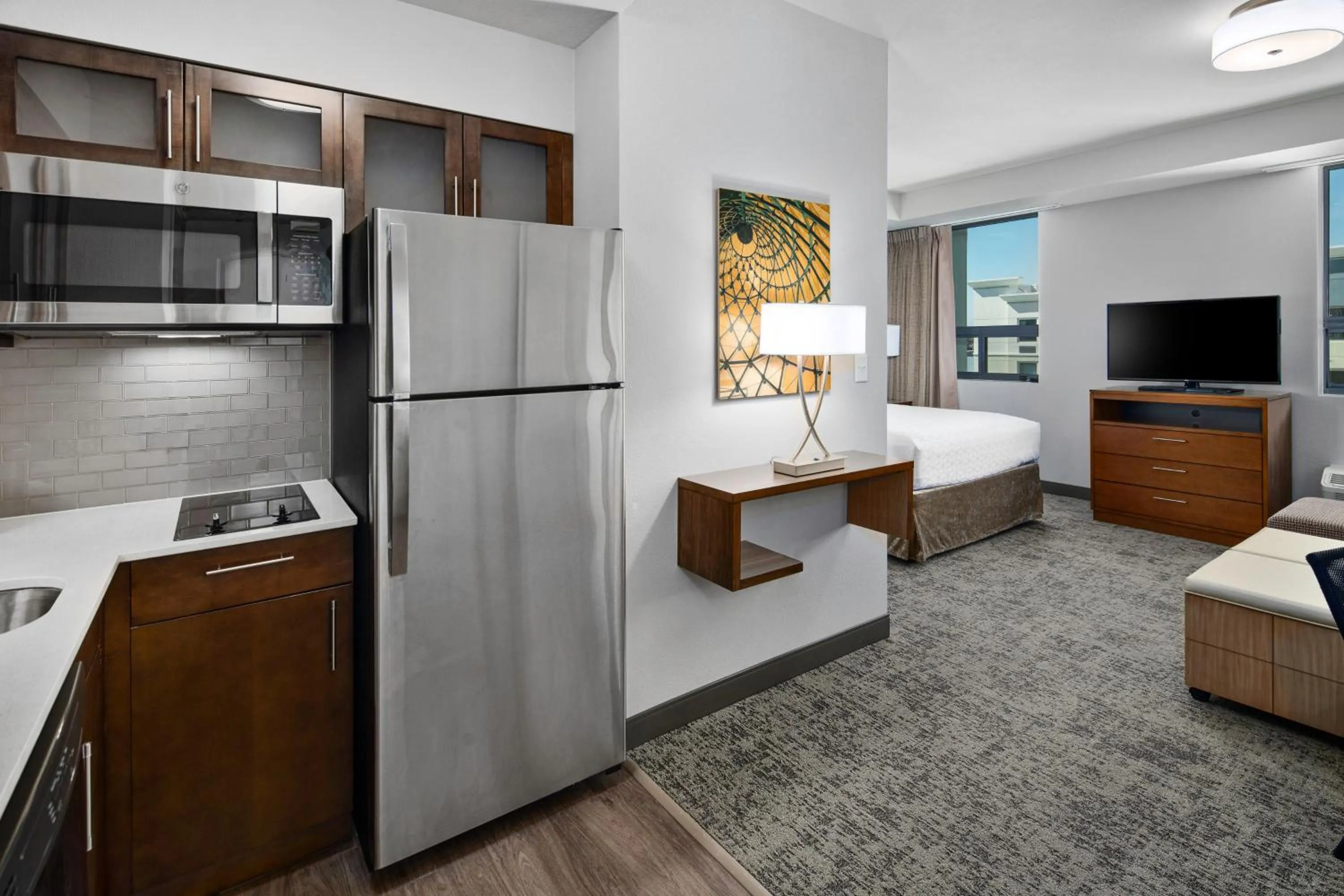 Kitchen or kitchenette, Bed in Staybridge Suites Irvine - John Wayne Airport by IHG