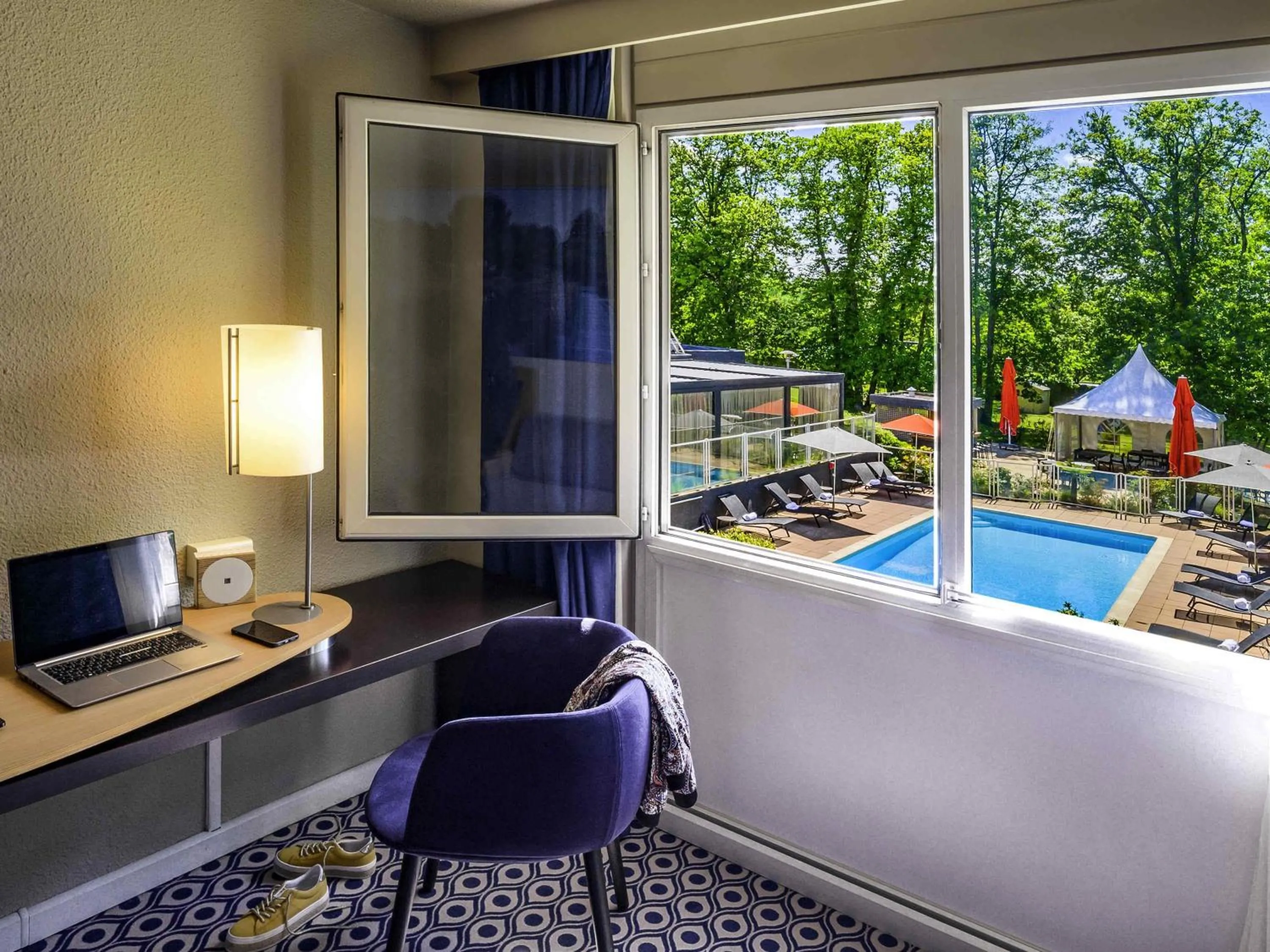 Bedroom in Novotel Orléans Chemins De Sologne Demeures De Campagne