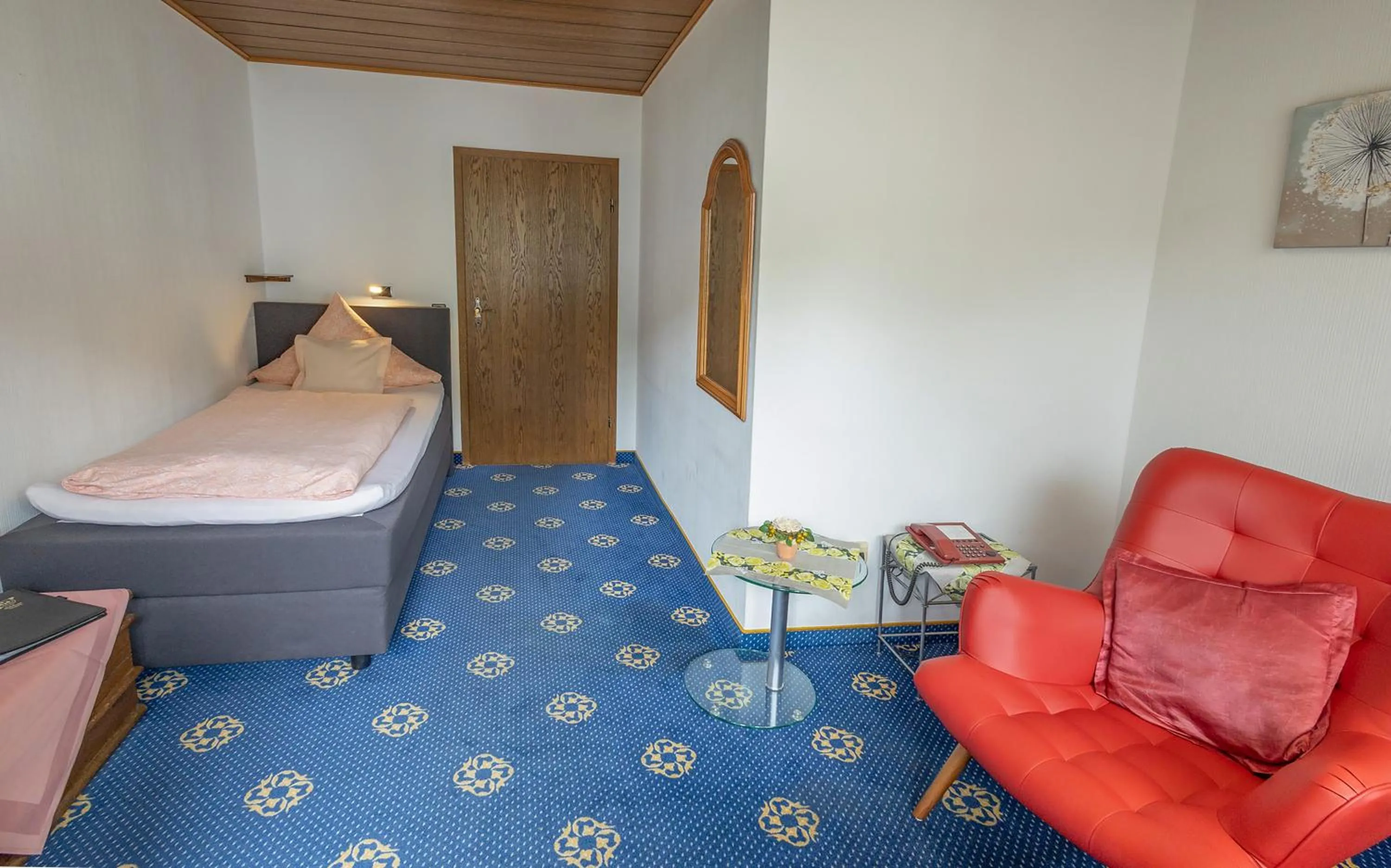 Bed in Sporthotel Göbel Garni