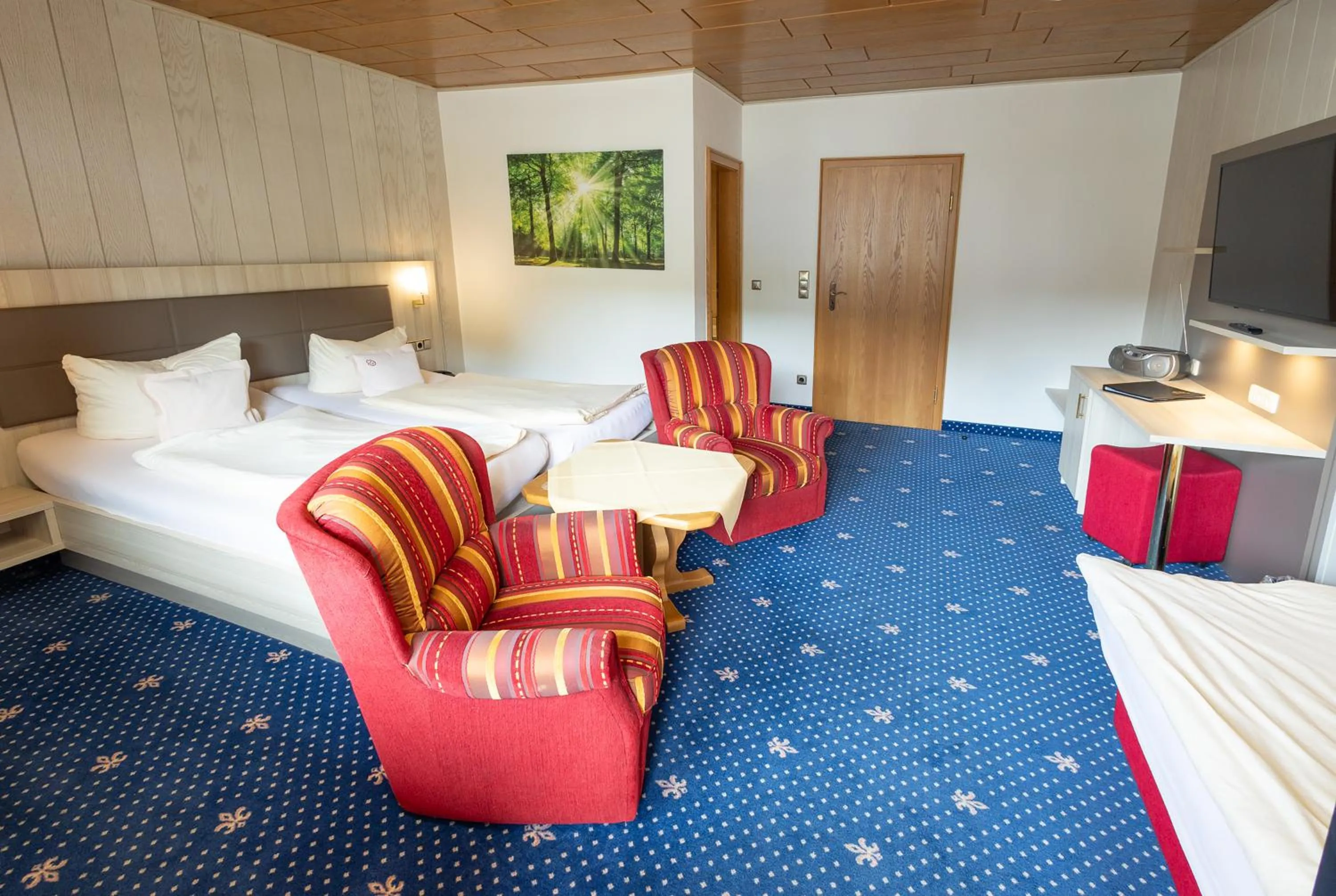 Bed in Sporthotel Göbel Garni