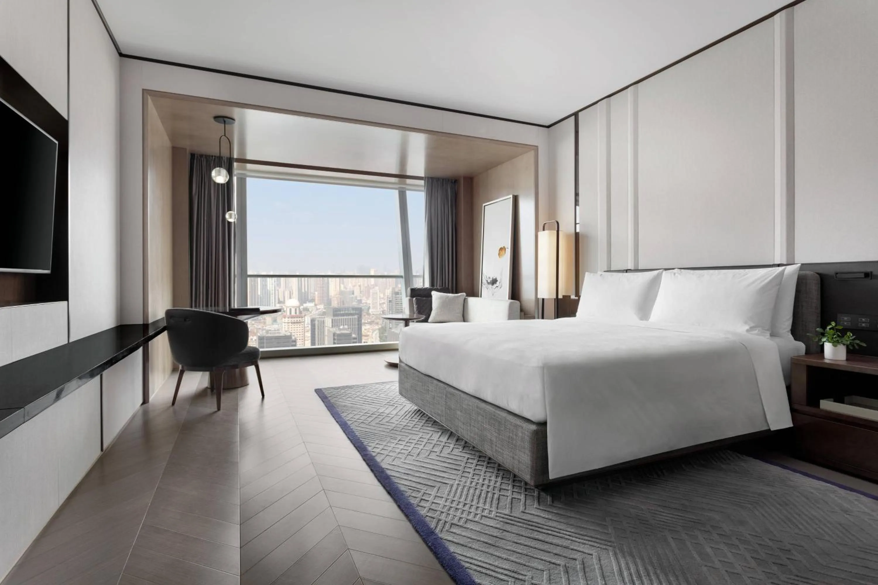 Photo of the whole room, Bed in JW Marriott Marquis Hotel Shanghai Pudong