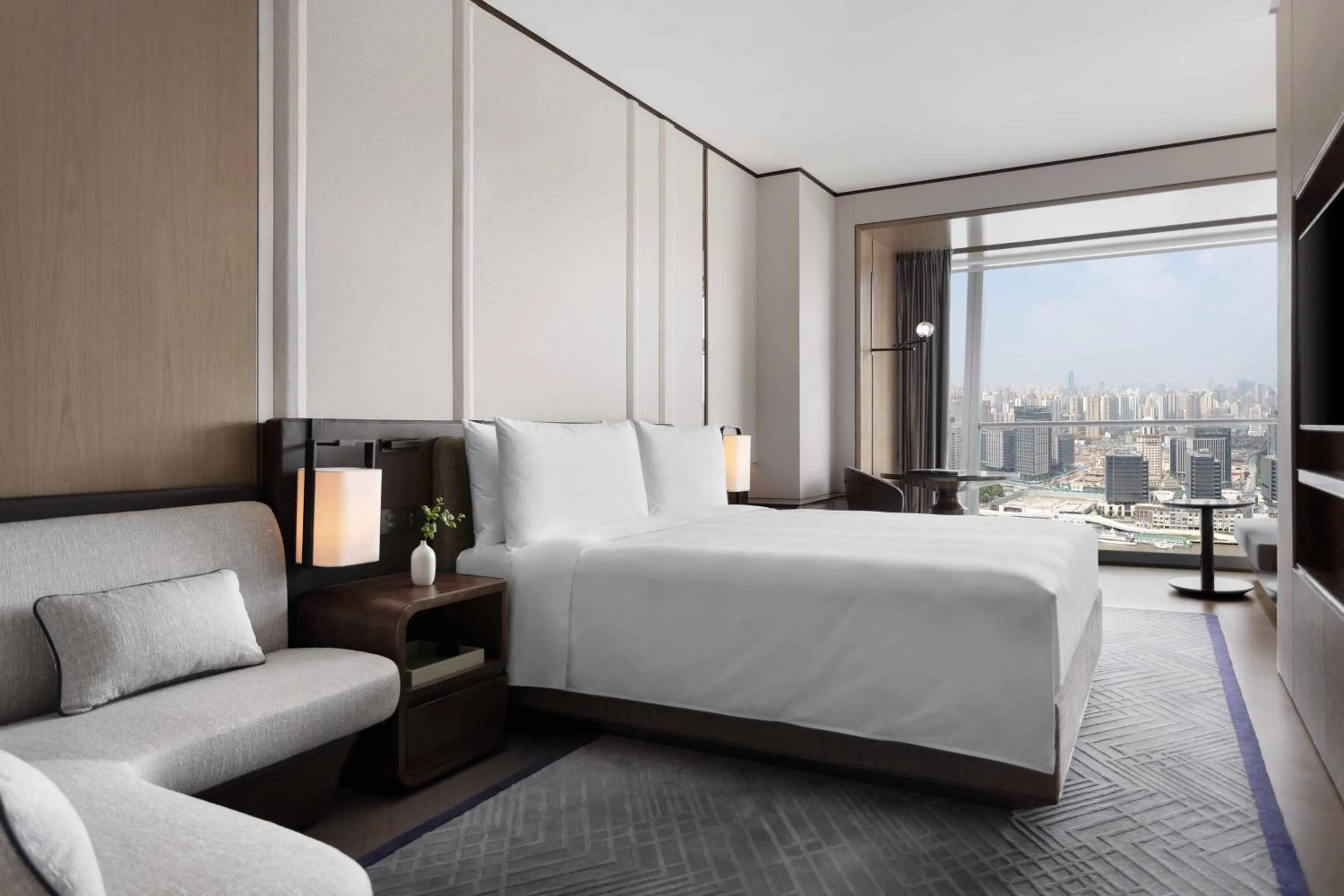 Photo of the whole room, Bed in JW Marriott Marquis Hotel Shanghai Pudong