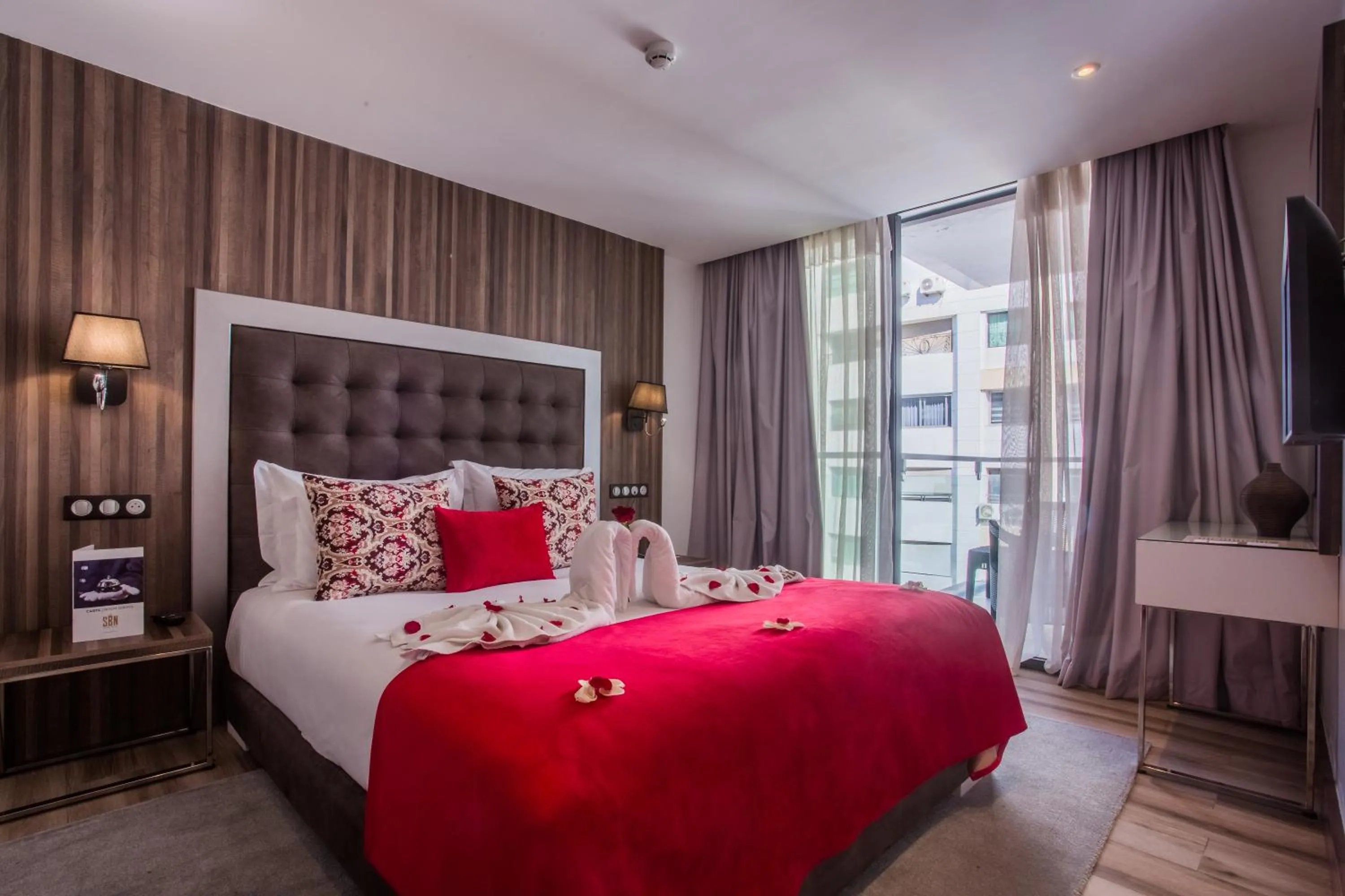 Bed in SBN Suite Hôtel