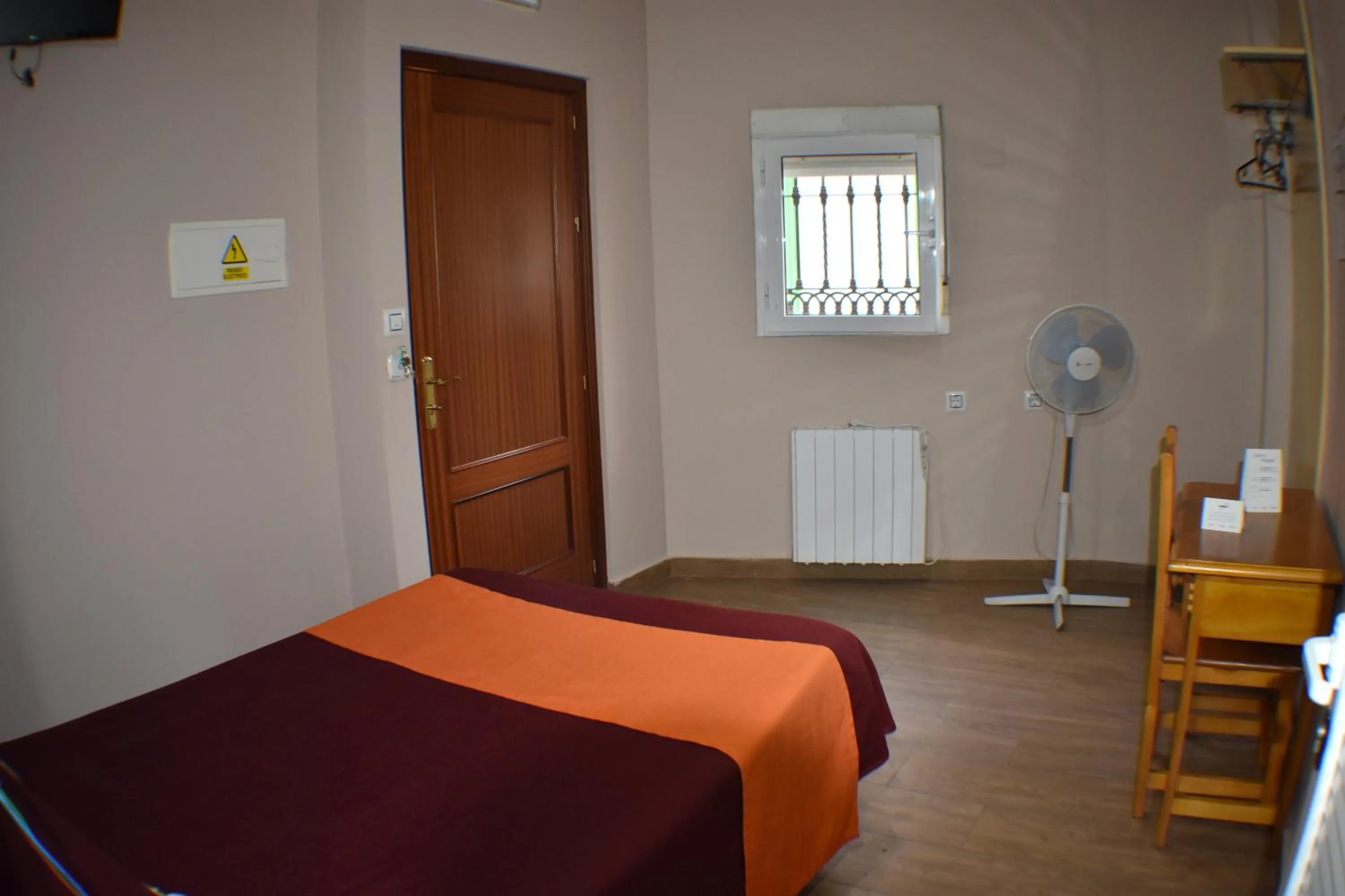 Photo of the whole room, Bed in Hostal Alamare