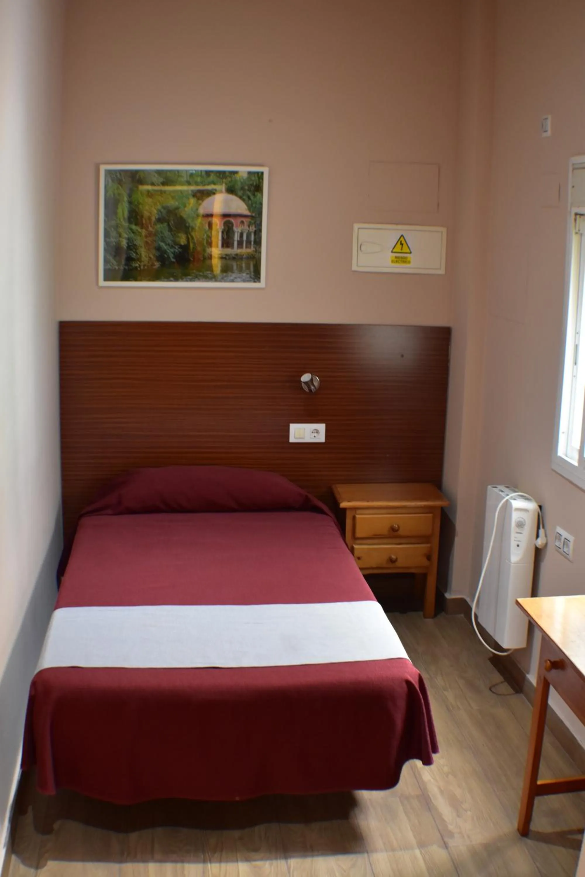 Photo of the whole room, Bed in Hostal Alamare