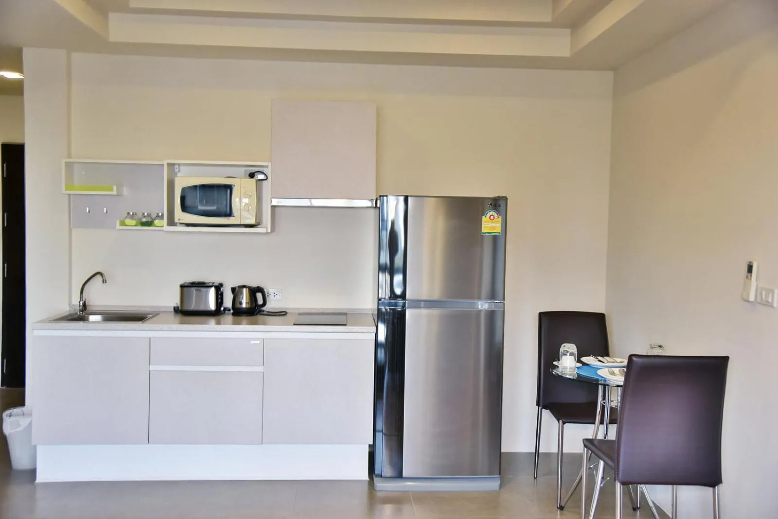 Kitchen or kitchenette in The Kaze 34 Hotel and Serviced Residence