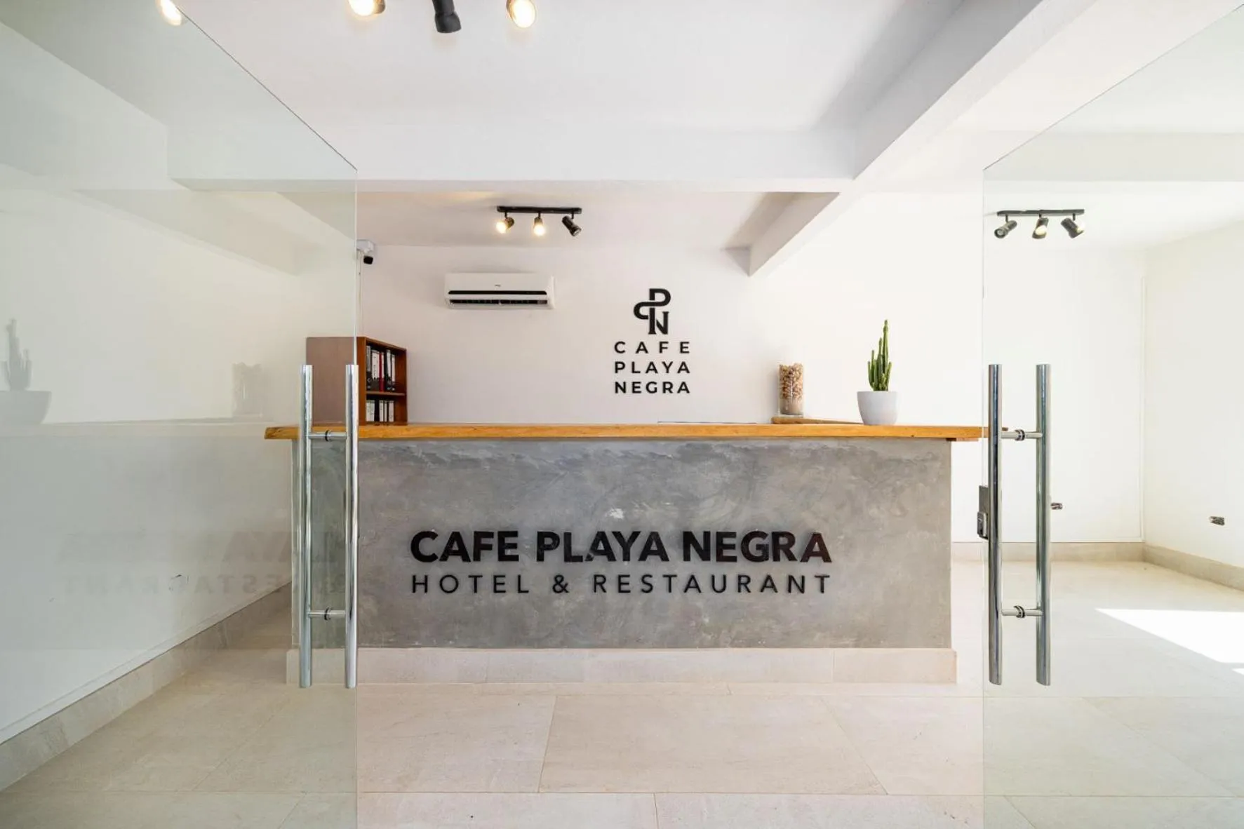 Lobby or reception in Cafe Playa Negra Hotel