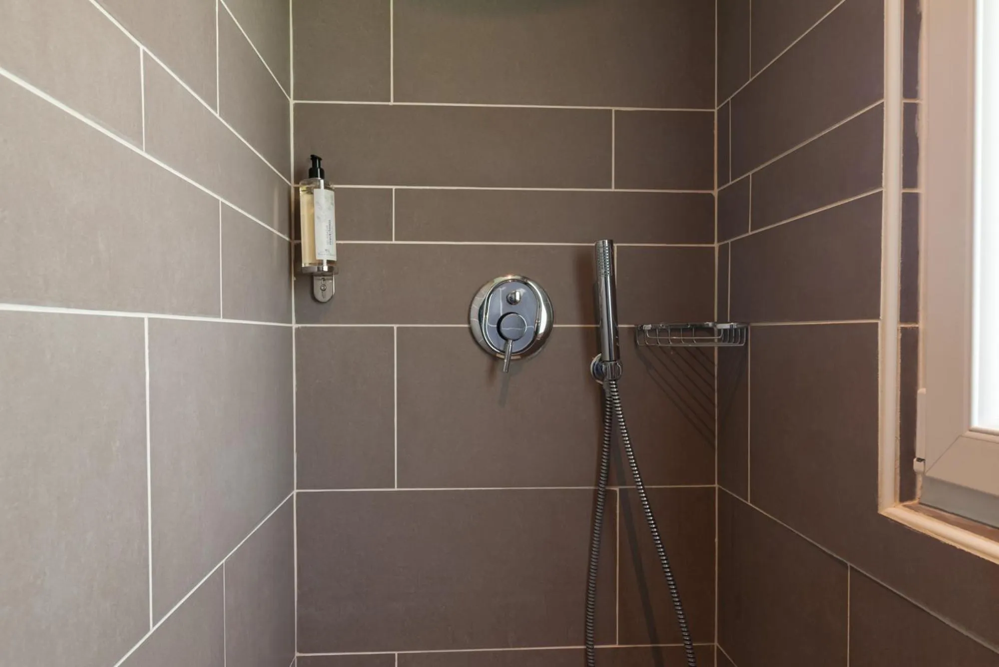 Bathroom in Les Villas d'Arromanches, Teritoria