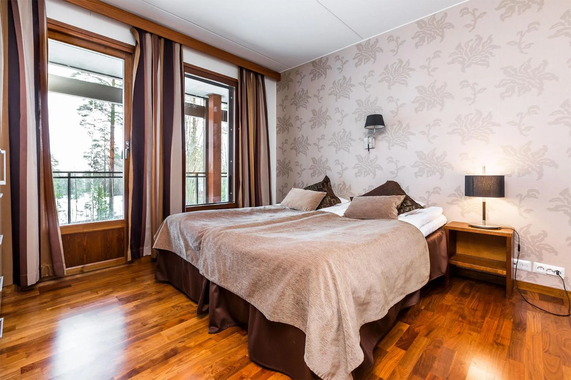 Bedroom, Bed in Imatran Kylpylä Spa Apartments