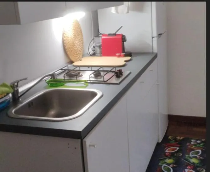 Kitchen or kitchenette in B&B Cuore del Palio