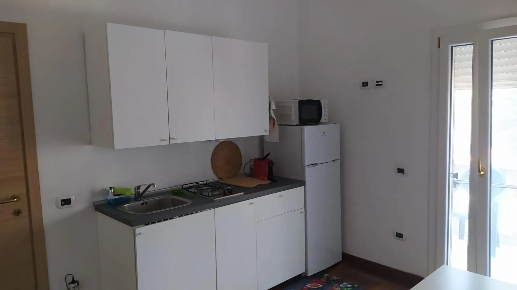 Kitchen or kitchenette in B&B Cuore del Palio