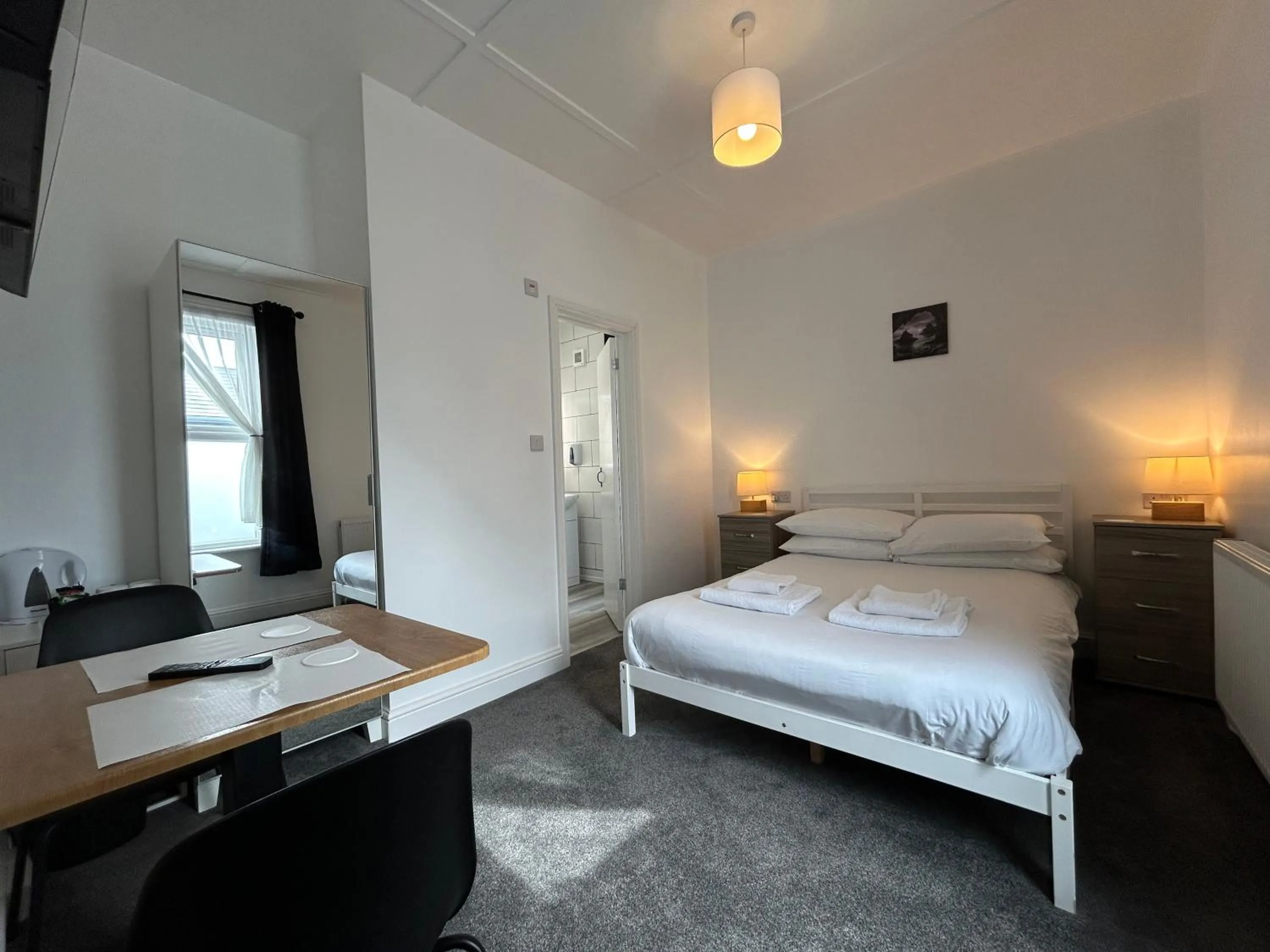 Photo of the whole room, Bed in The Royal Clarence Hotel (on the Seafront)