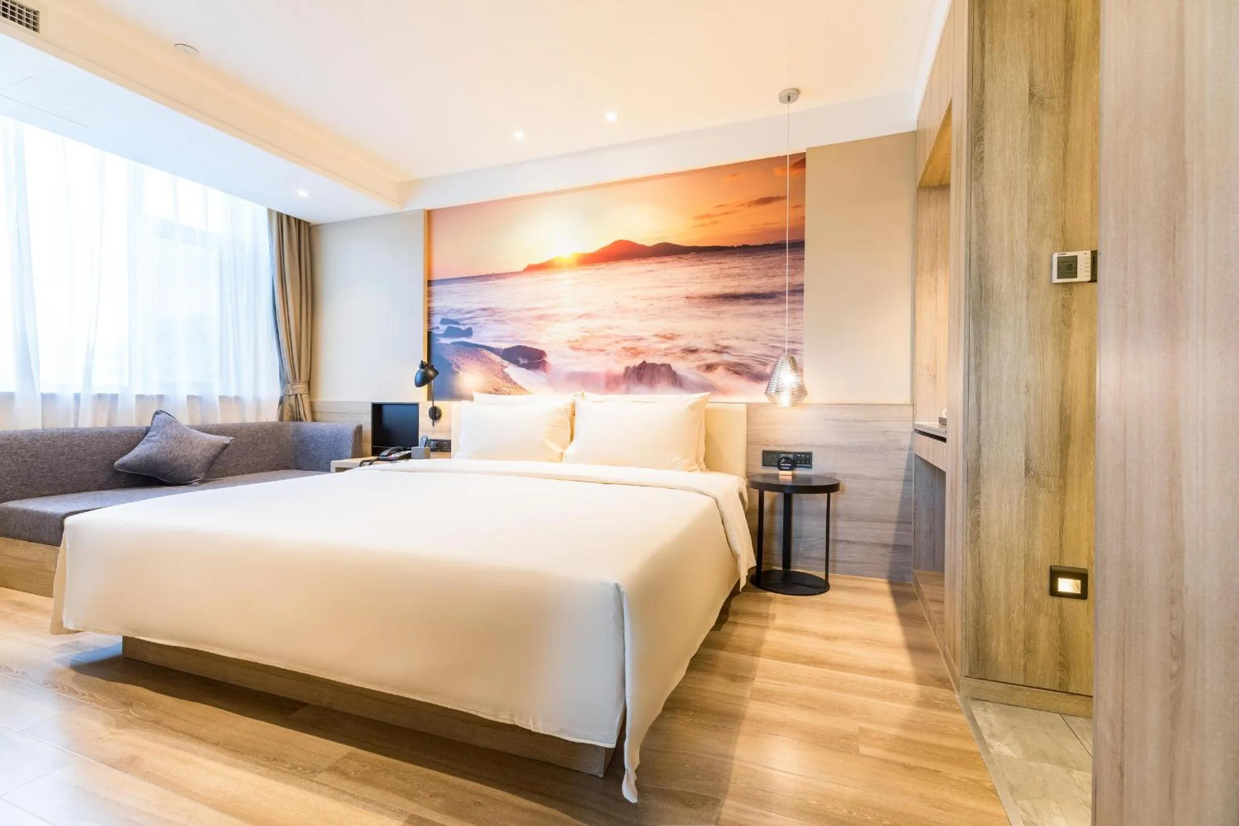 Bed in Atour Hotel Weihai City Center