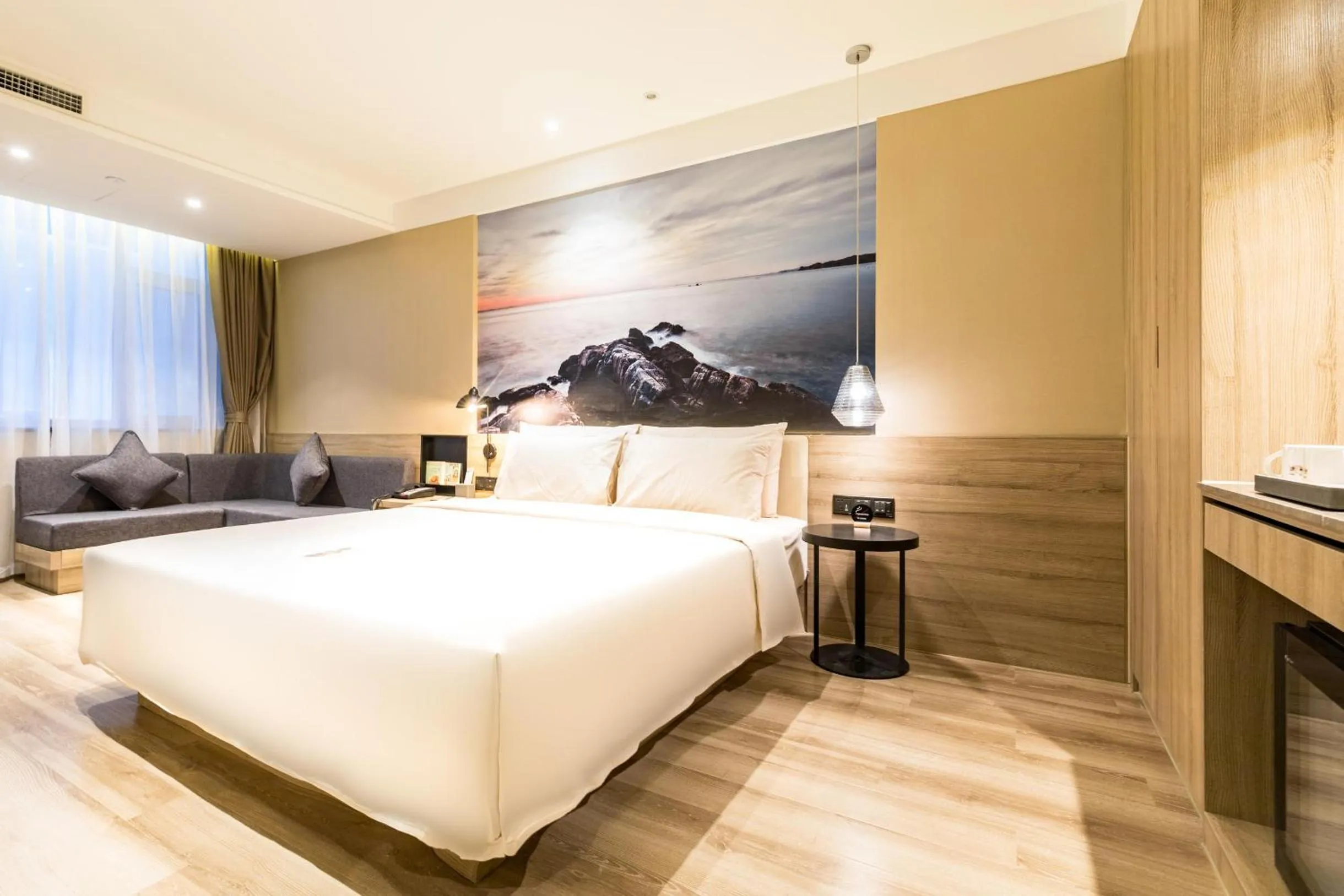Bed in Atour Hotel Weihai City Center