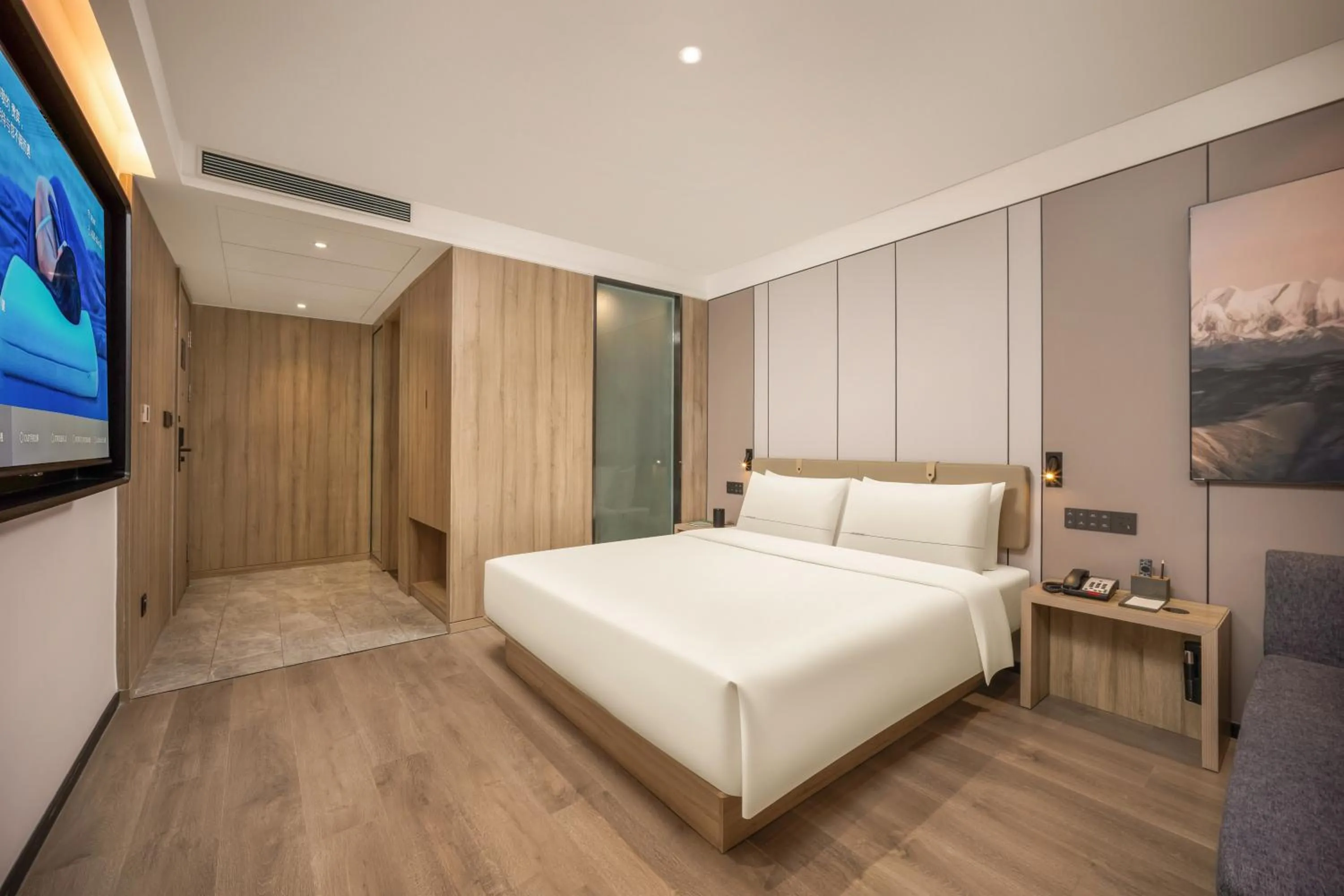 Bed in Atour Hotel Weihai City Center