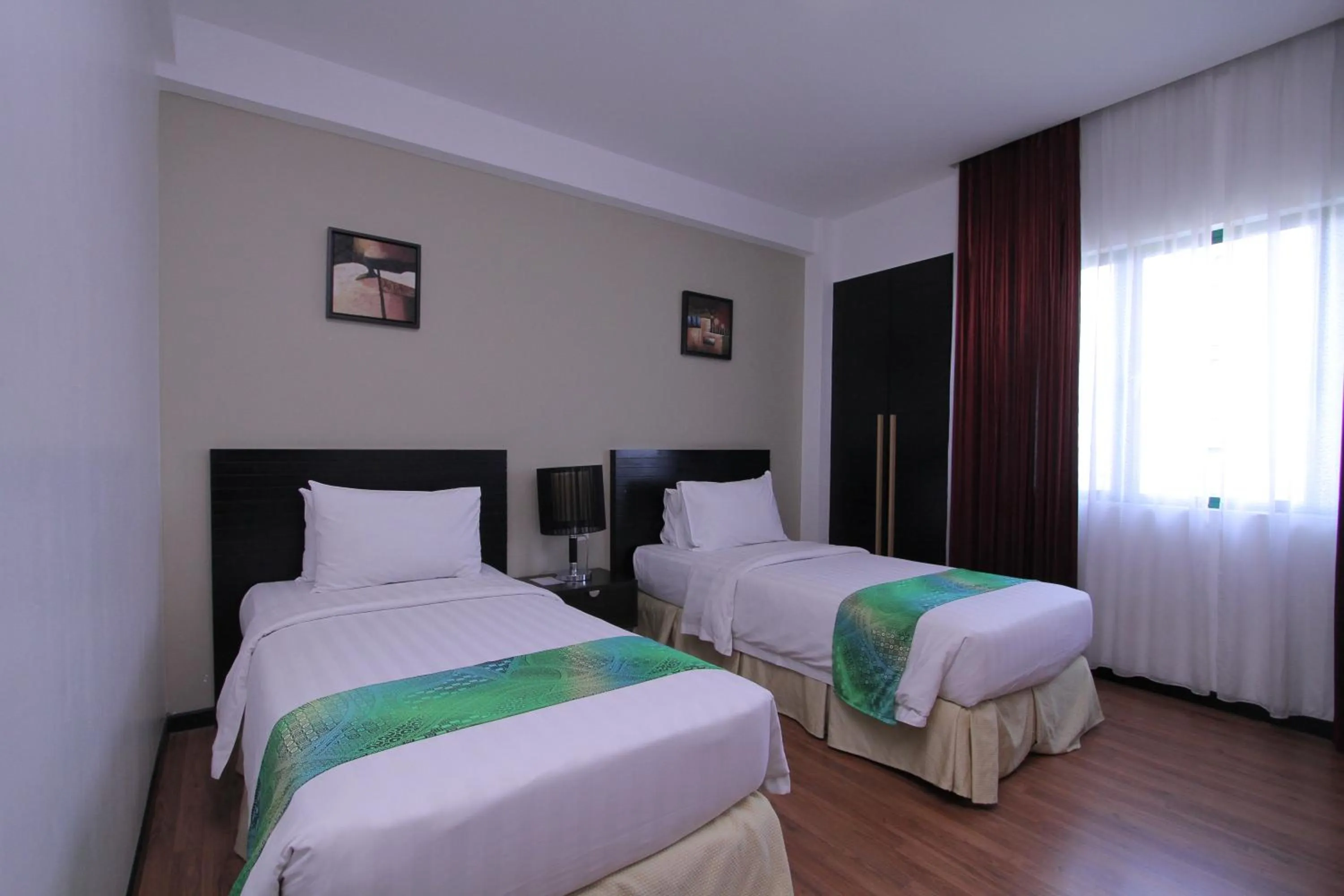 Bed in Likas Square - KK Apartment Suite