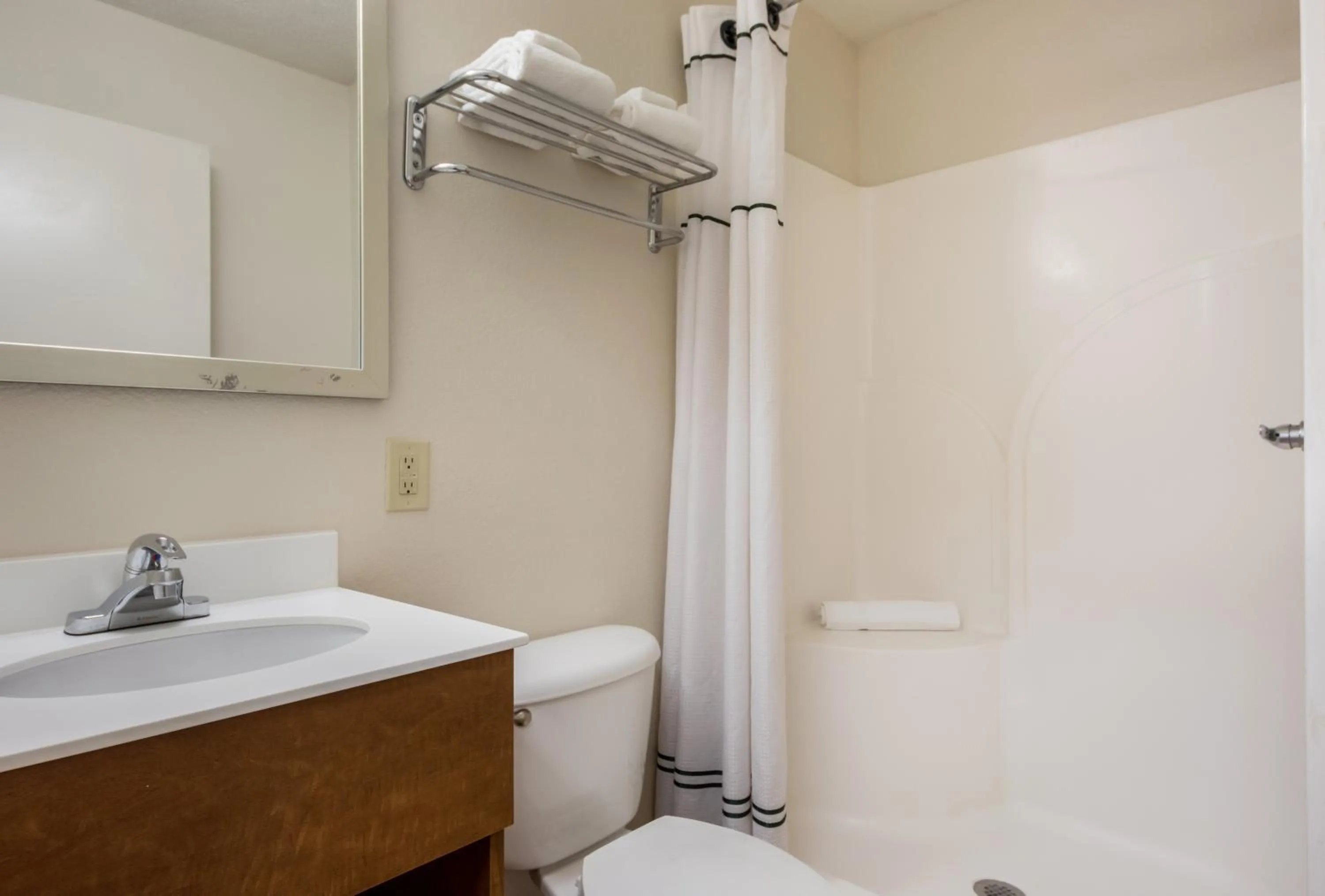 Photo of the whole room in HomeTowne Studios by Red Roof Dallas - Mesquite