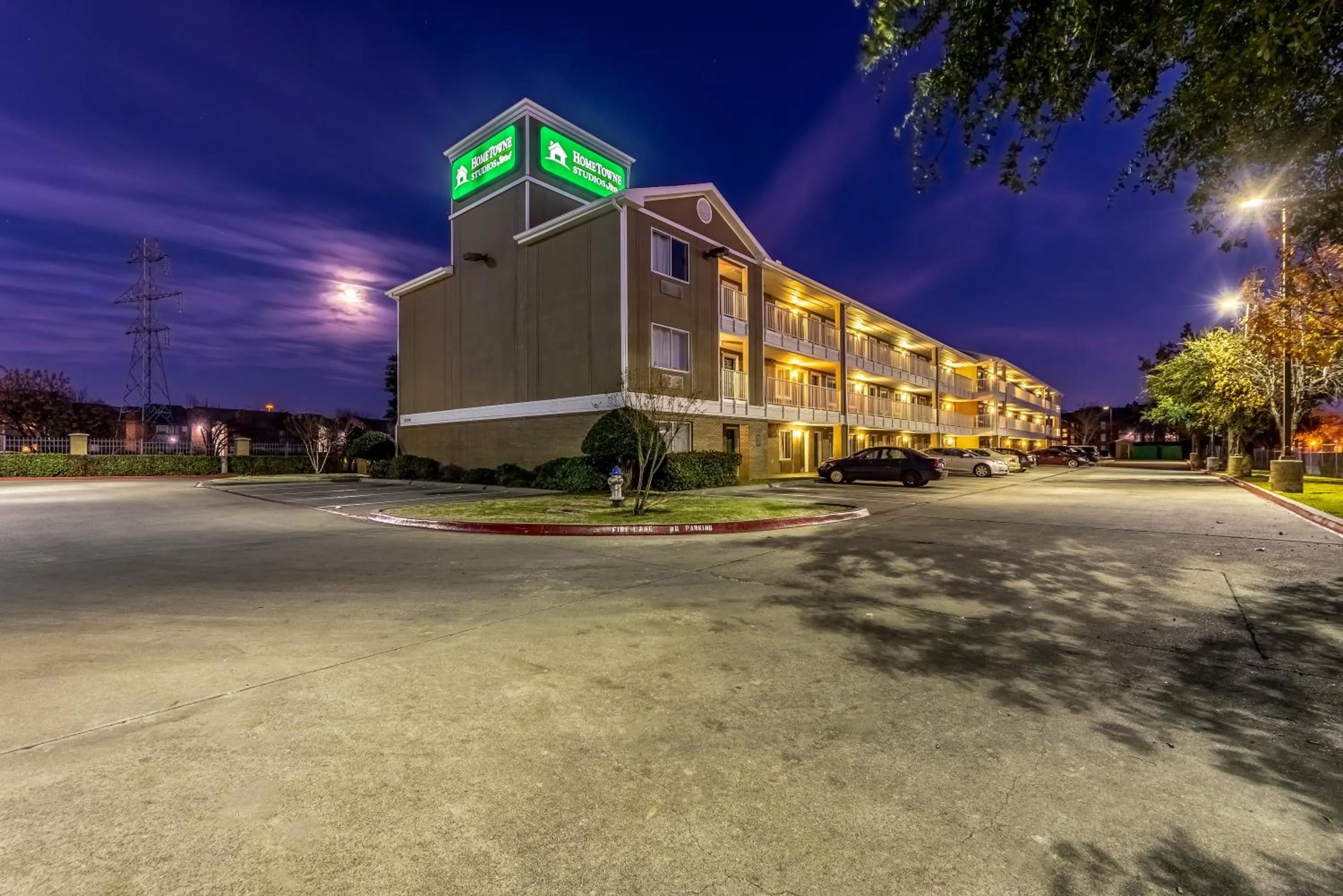 Property building in HomeTowne Studios by Red Roof Dallas - Mesquite