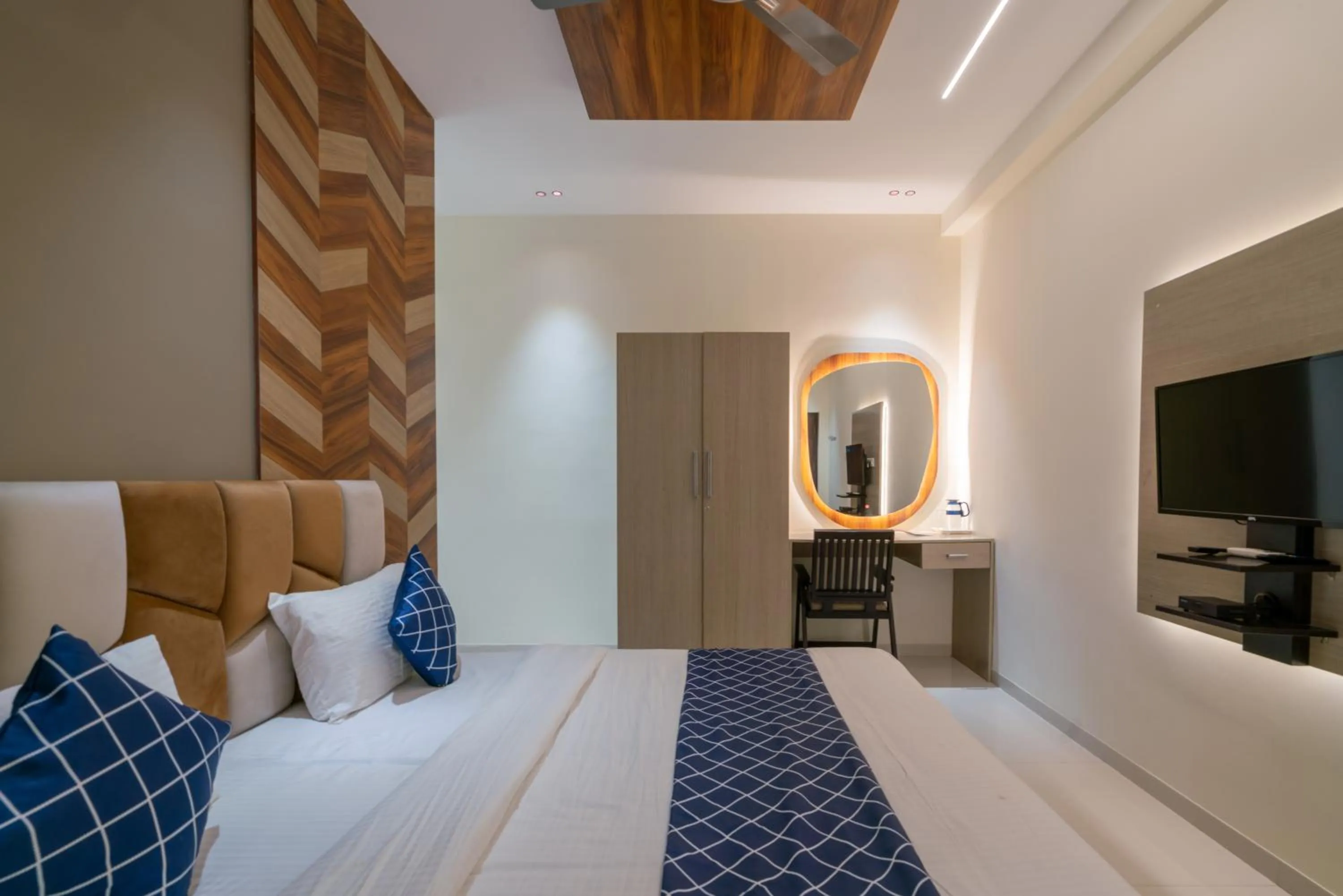 Bed in THE SURRYA MAX RESIDENCY