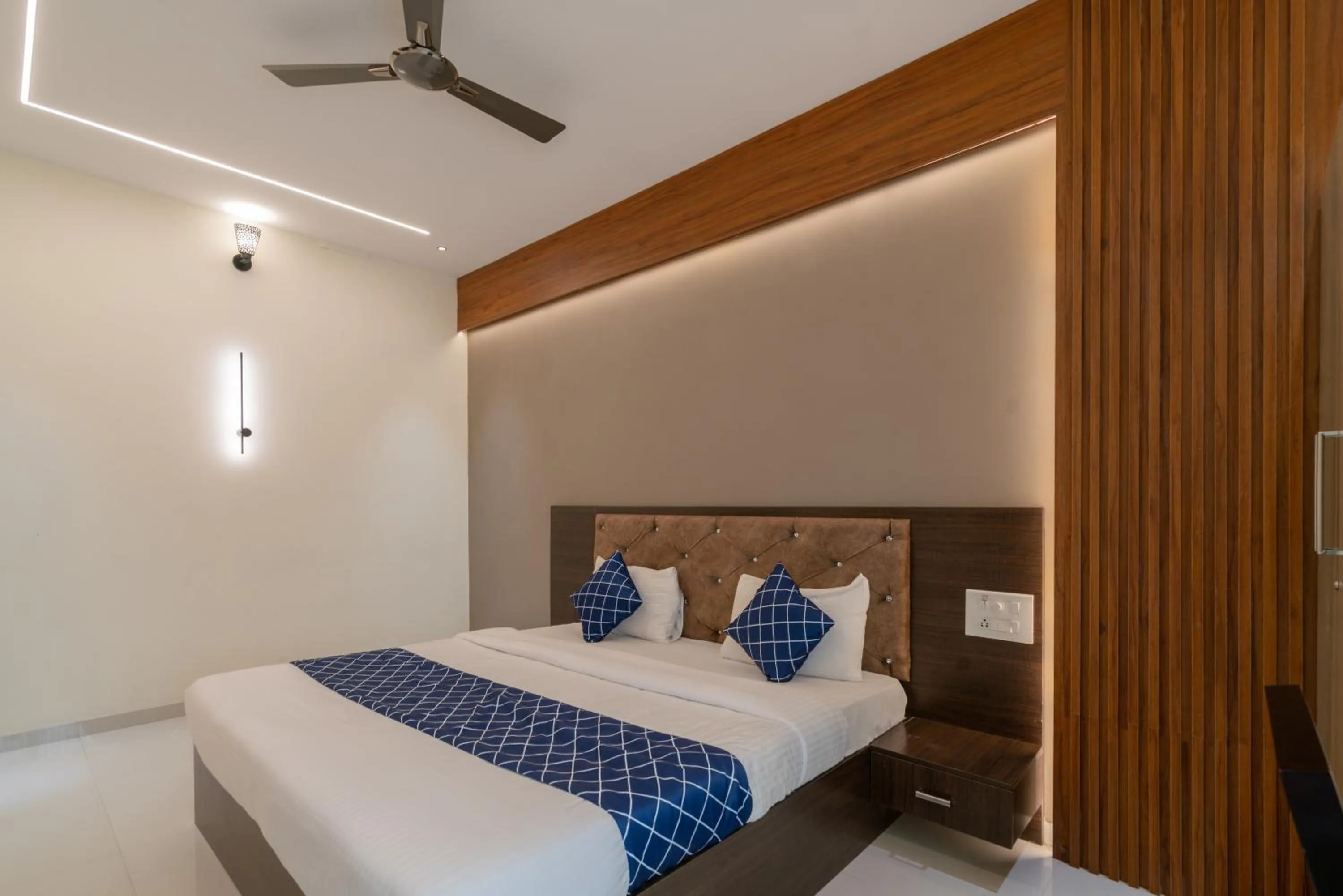 Bed in THE SURRYA MAX RESIDENCY