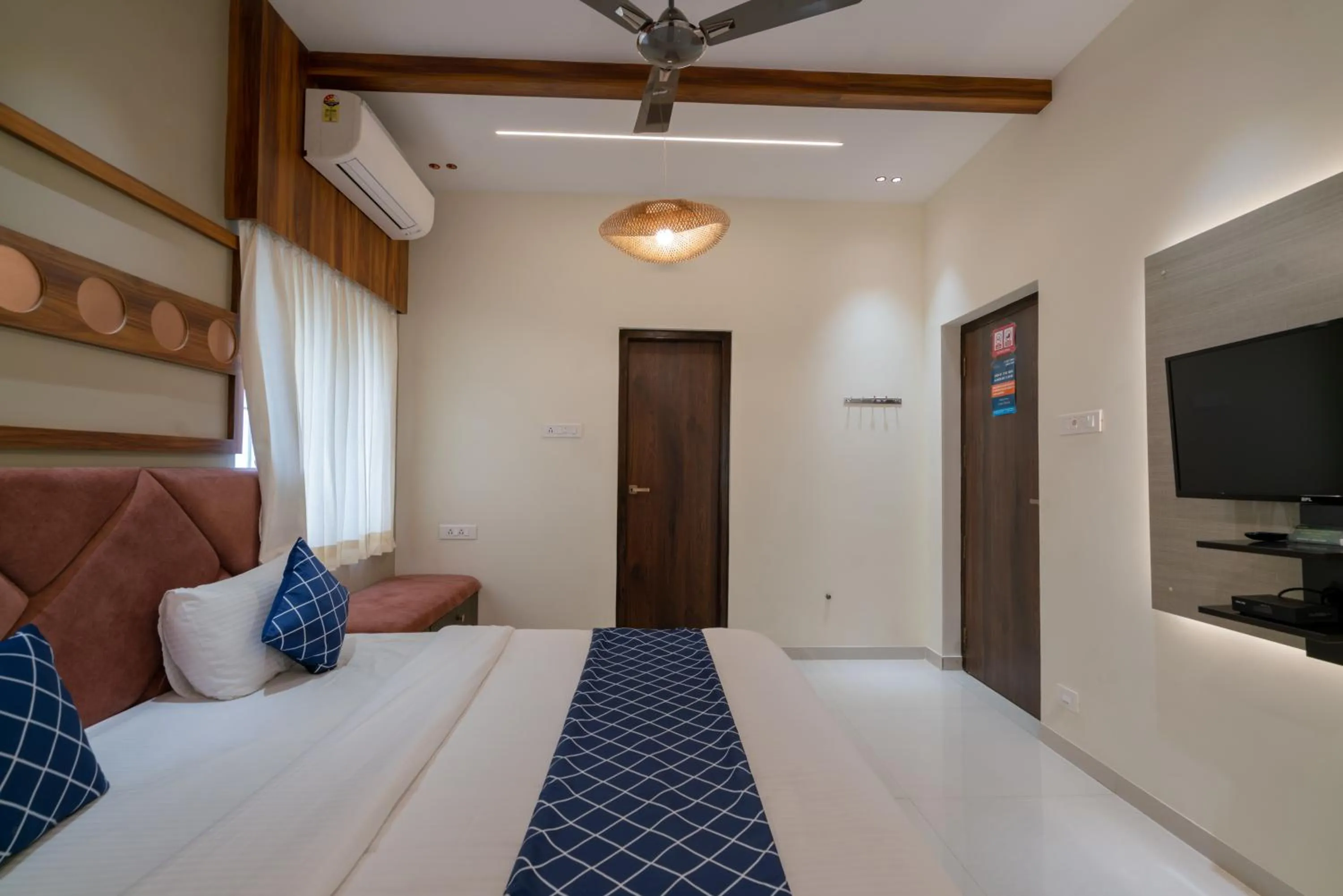 Bed in THE SURRYA MAX RESIDENCY