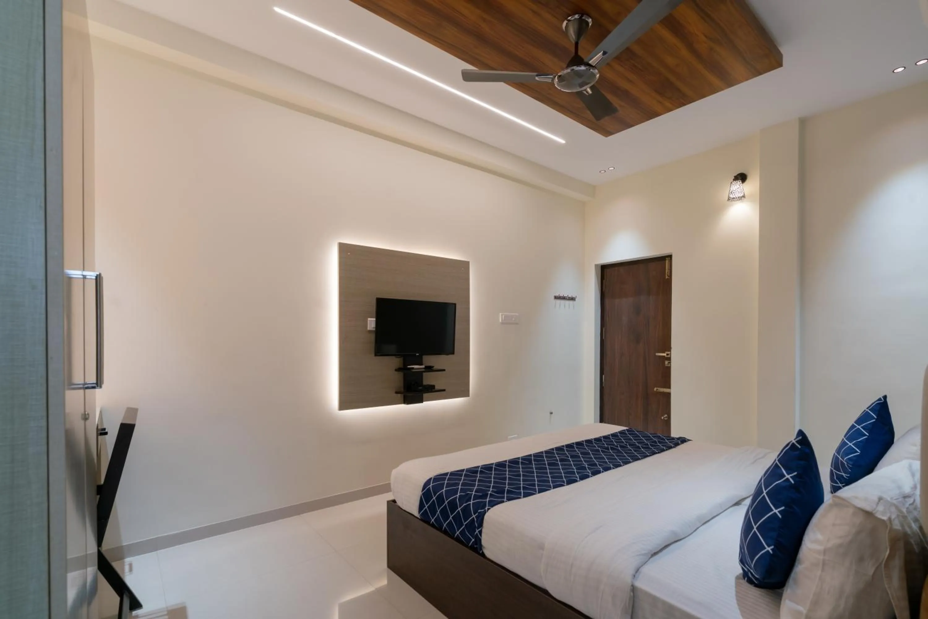 Bed in THE SURRYA MAX RESIDENCY