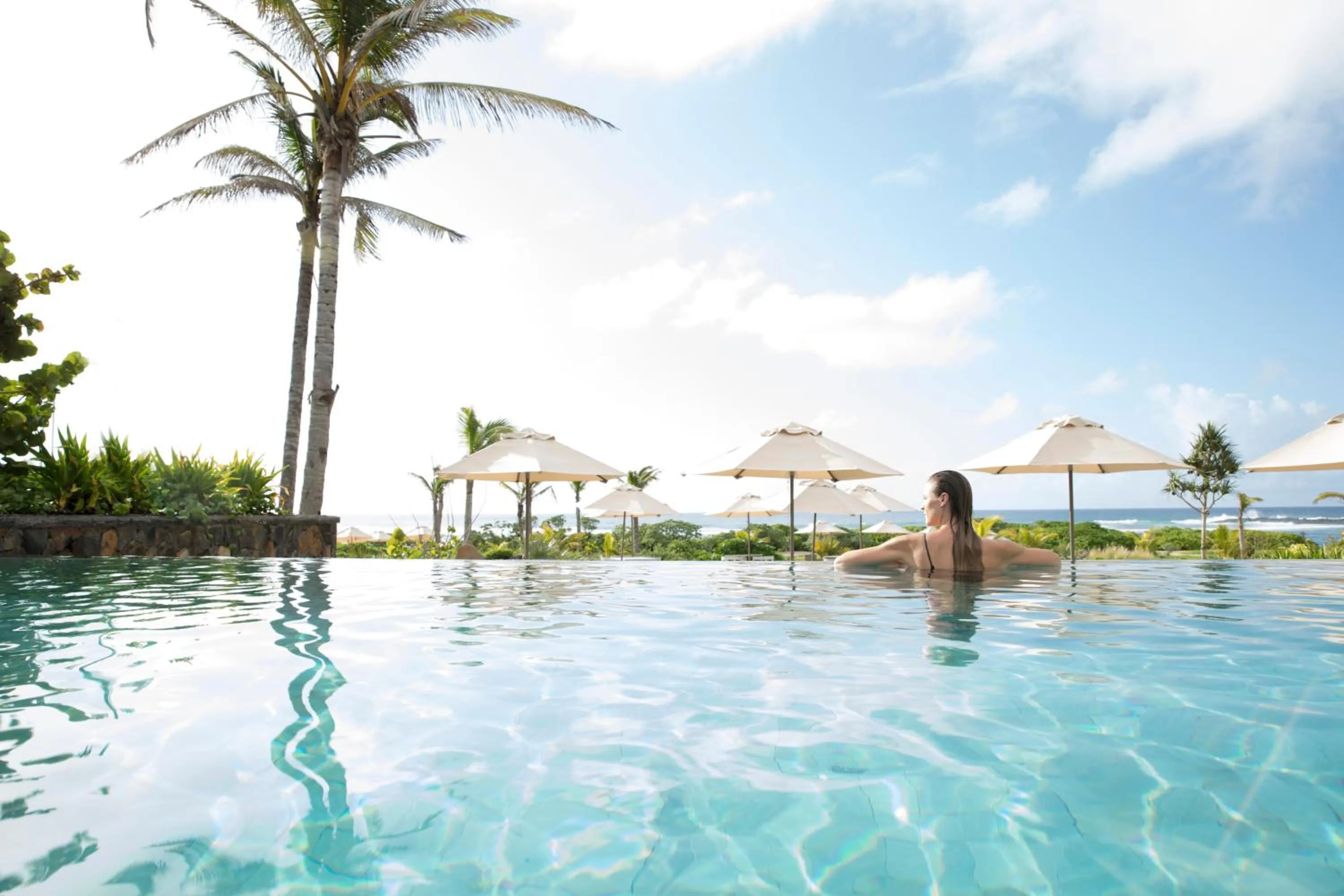 Swimming pool in Anantara Iko Mauritius Resort & Villas