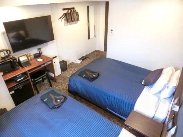 Bedroom, Bed in Natural Hot Spring Hotel Livemax Premium Hiroshima
