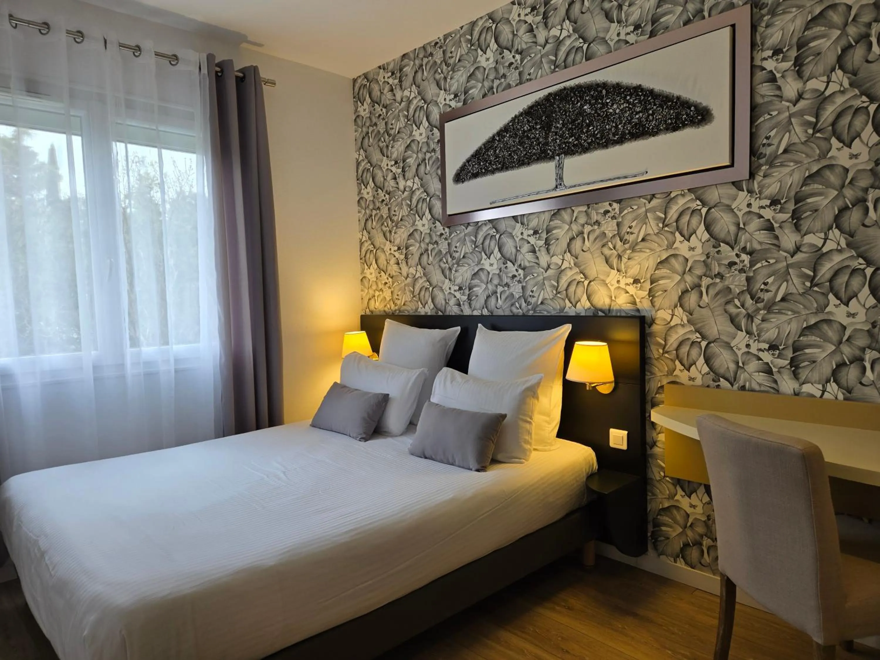 Bed in Hôtel Le SAINT-GENIÈS