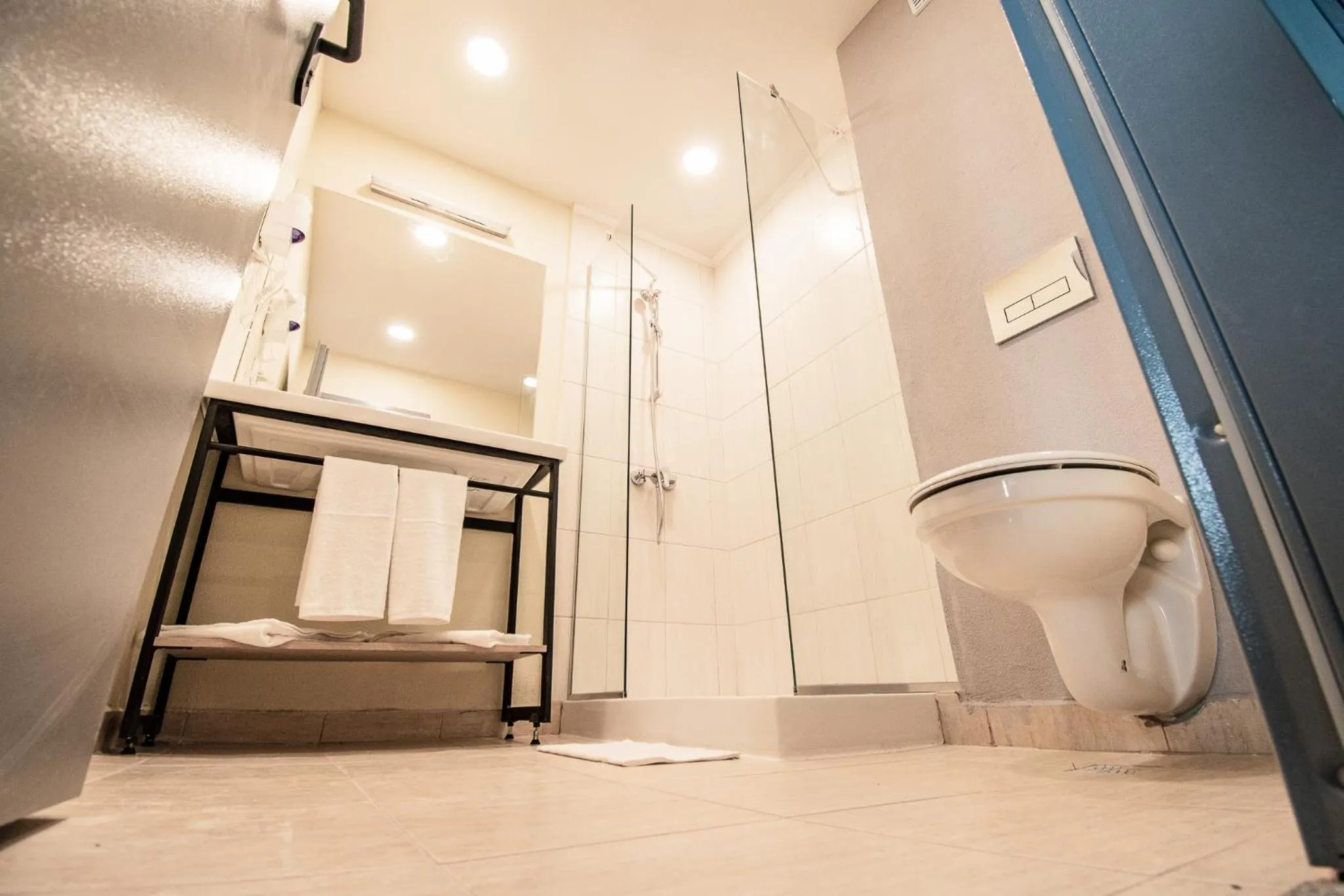 Bathroom in A&M Hotel with free parking