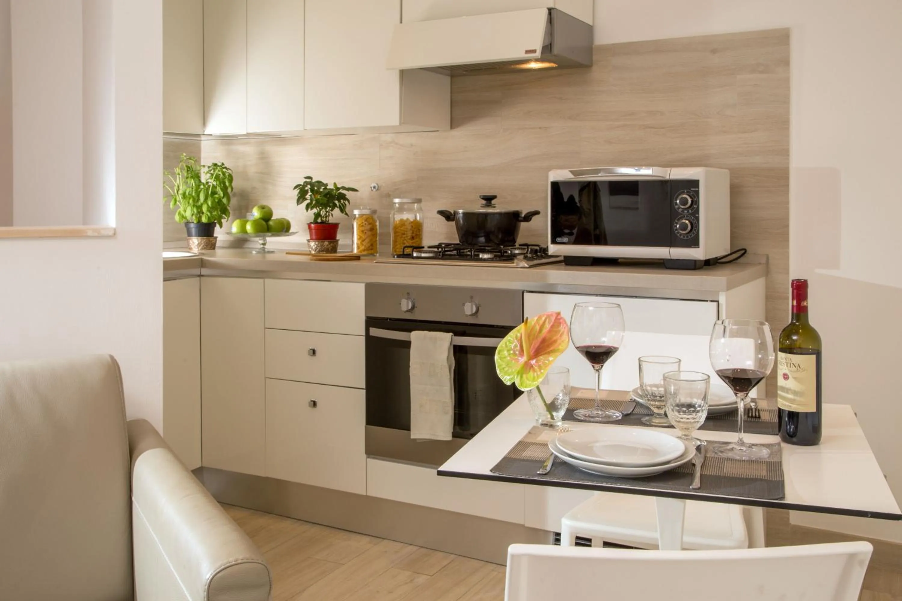 Kitchen or kitchenette in Vatican Studio Apartment