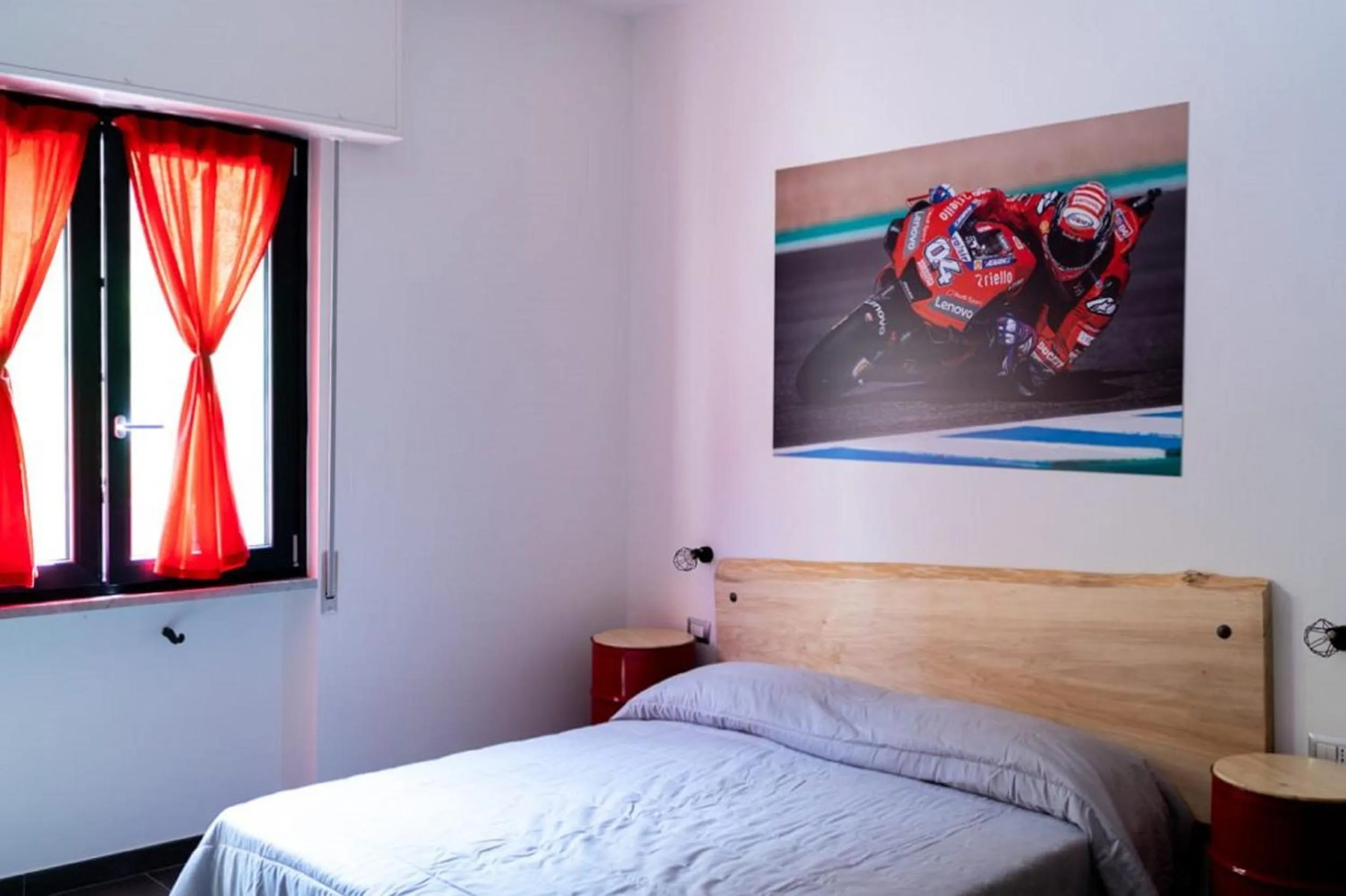 Bedroom in Italian Piston House Sport Moto Rent