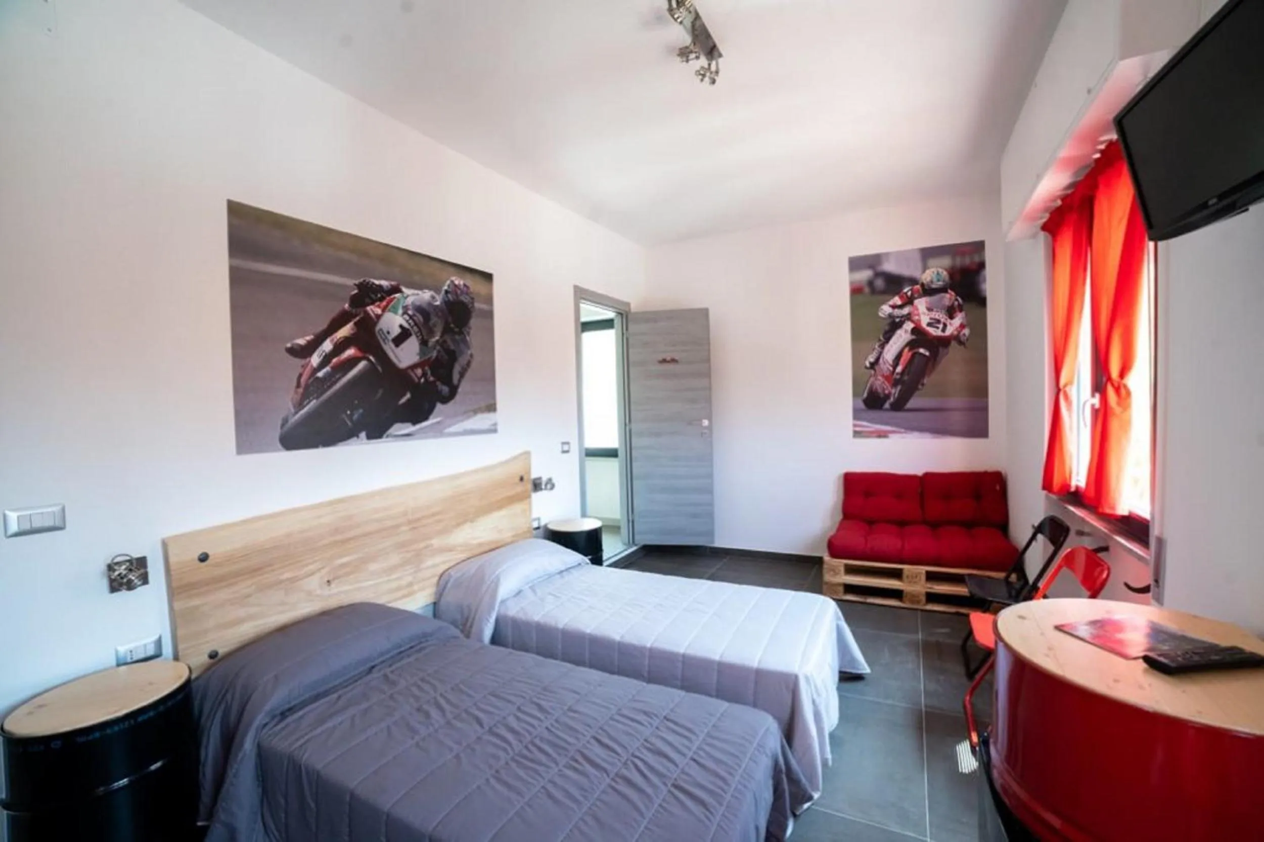 Bedroom in Italian Piston House Sport Moto Rent