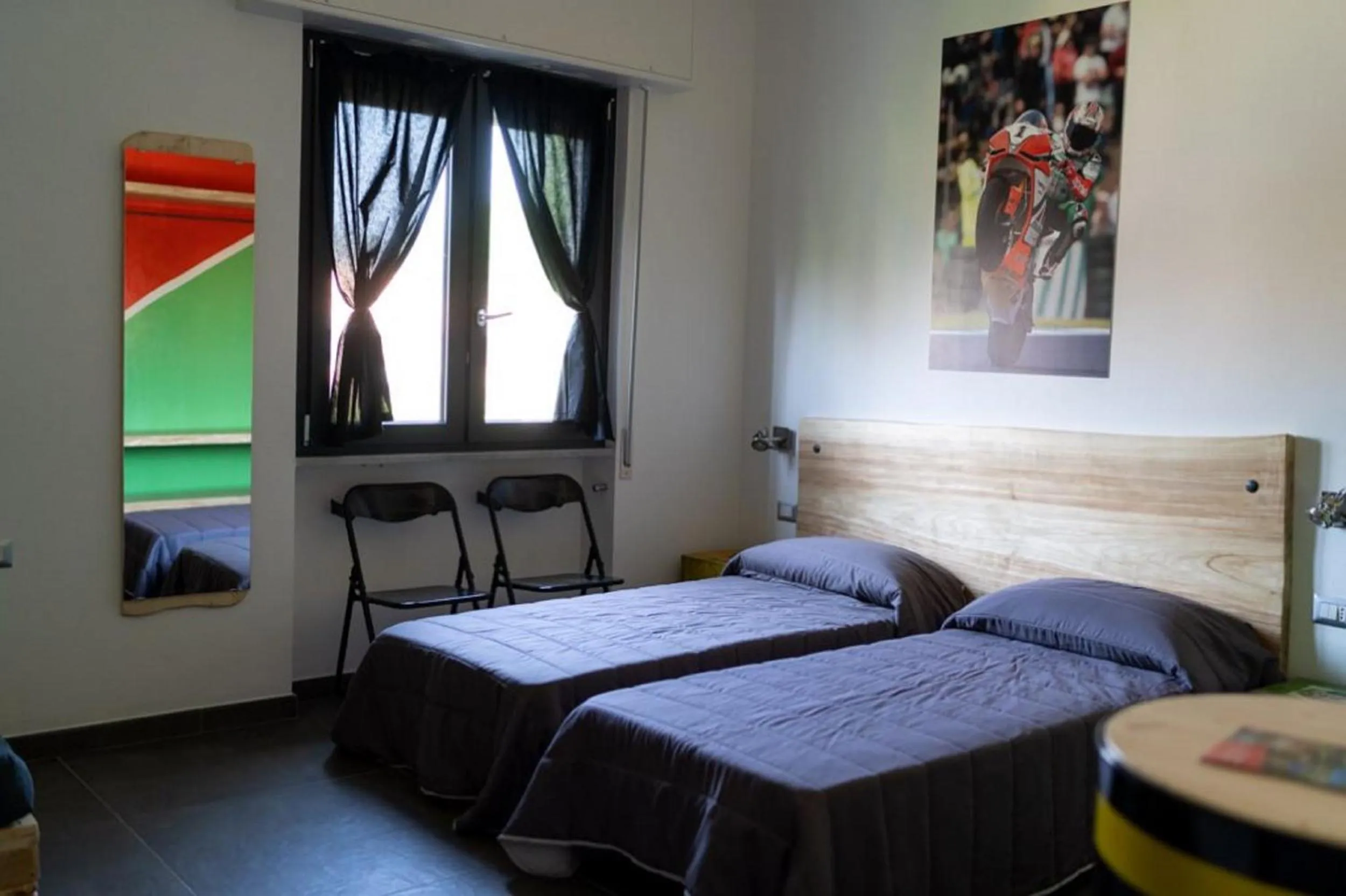 Photo of the whole room in Italian Piston House Sport Moto Rent