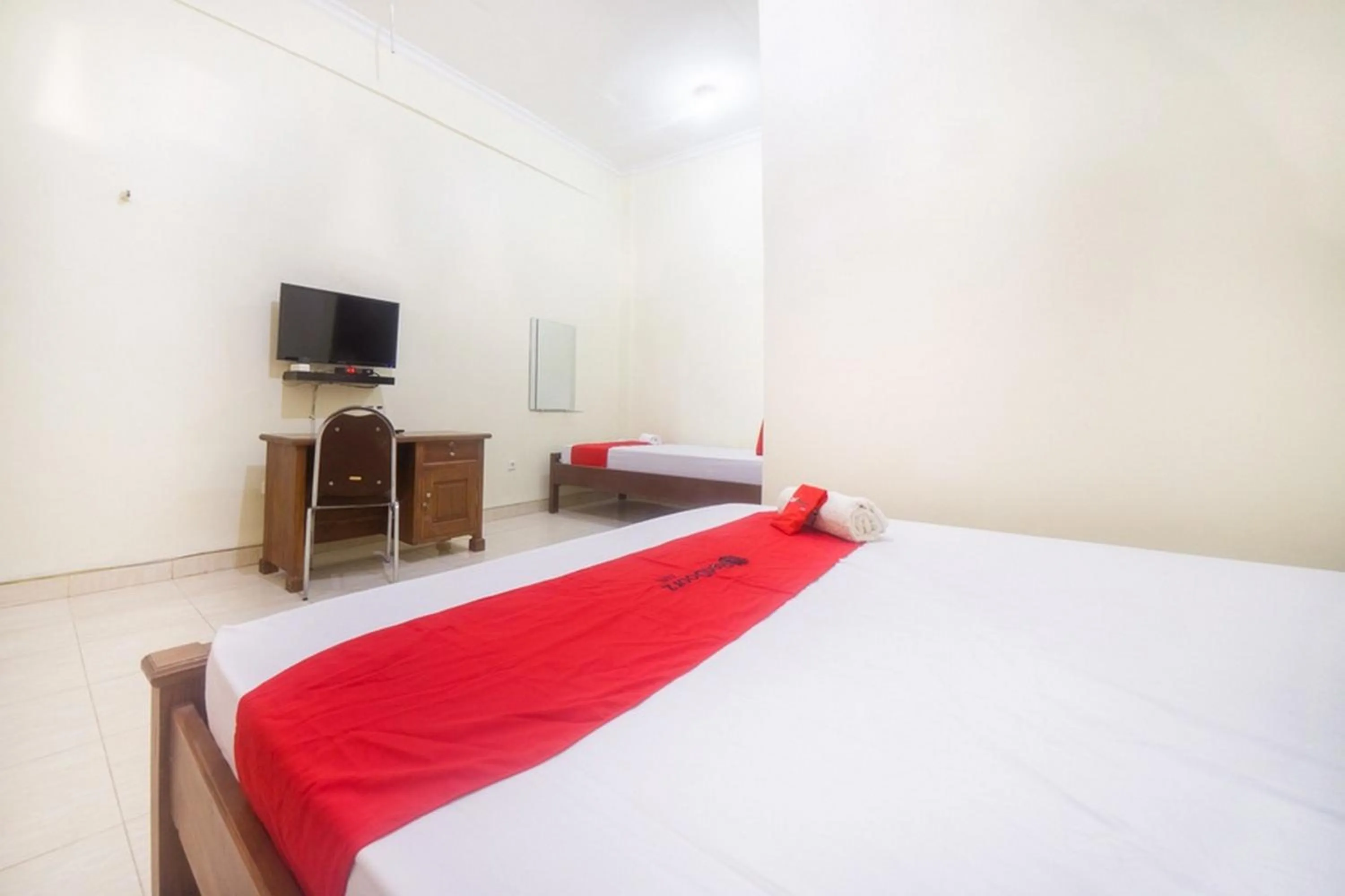 Bed in RedDoorz near Nusa Cendana University