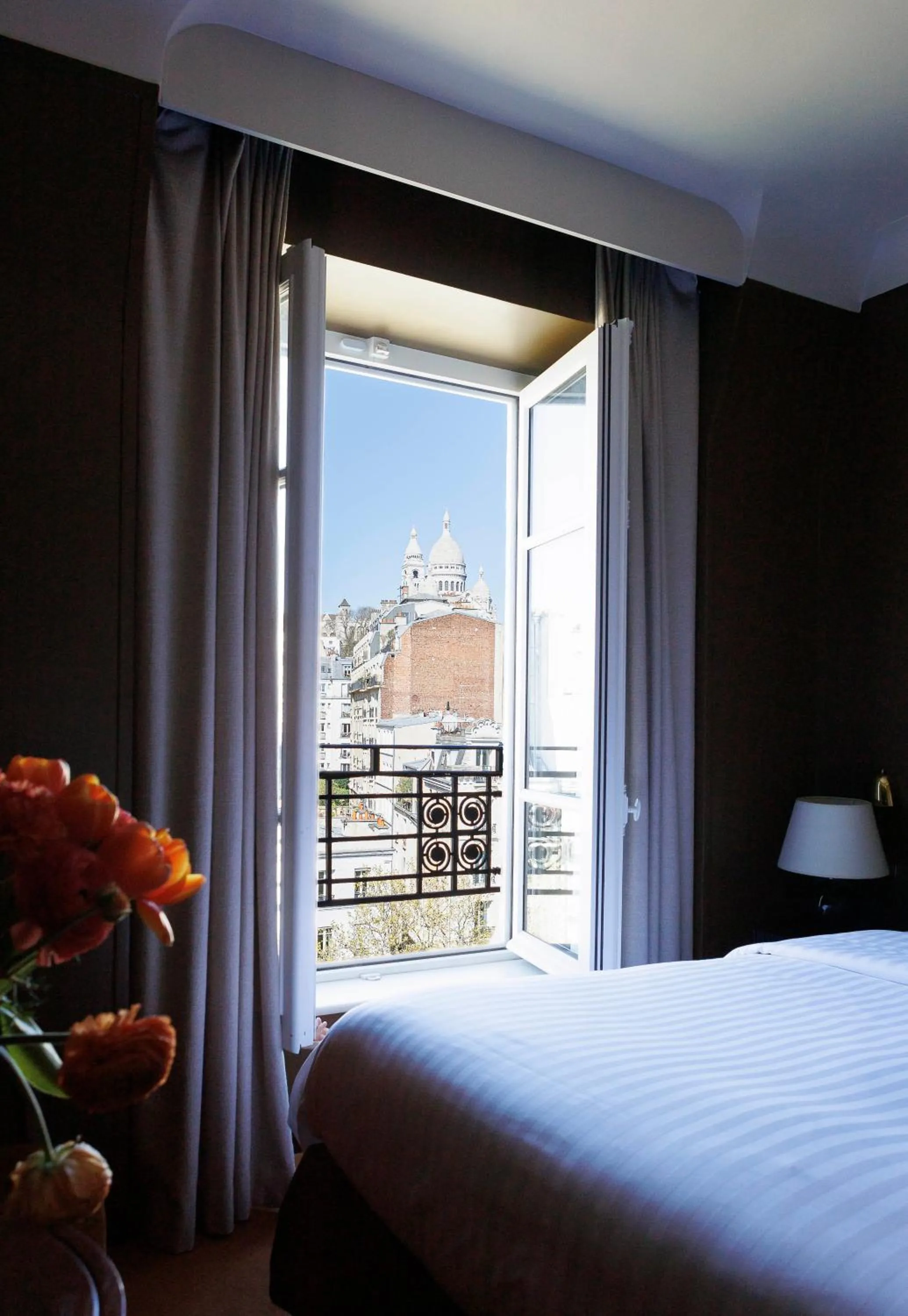 View (from property/room), Bed in Hotel Rochechouart, a Member of Design Hotels - Orso Hotels
