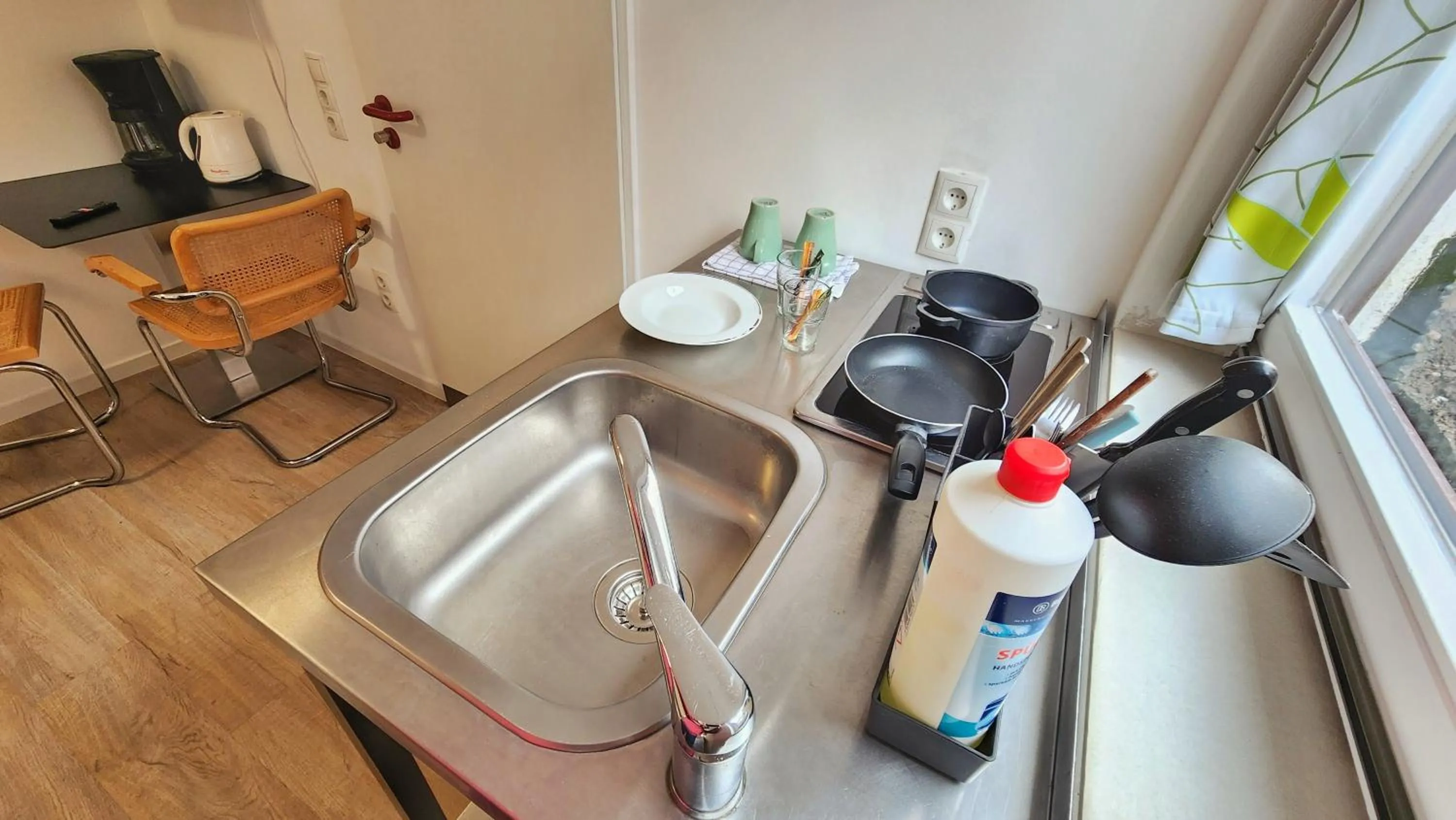 Kitchen or kitchenette in Aparthotel B & L