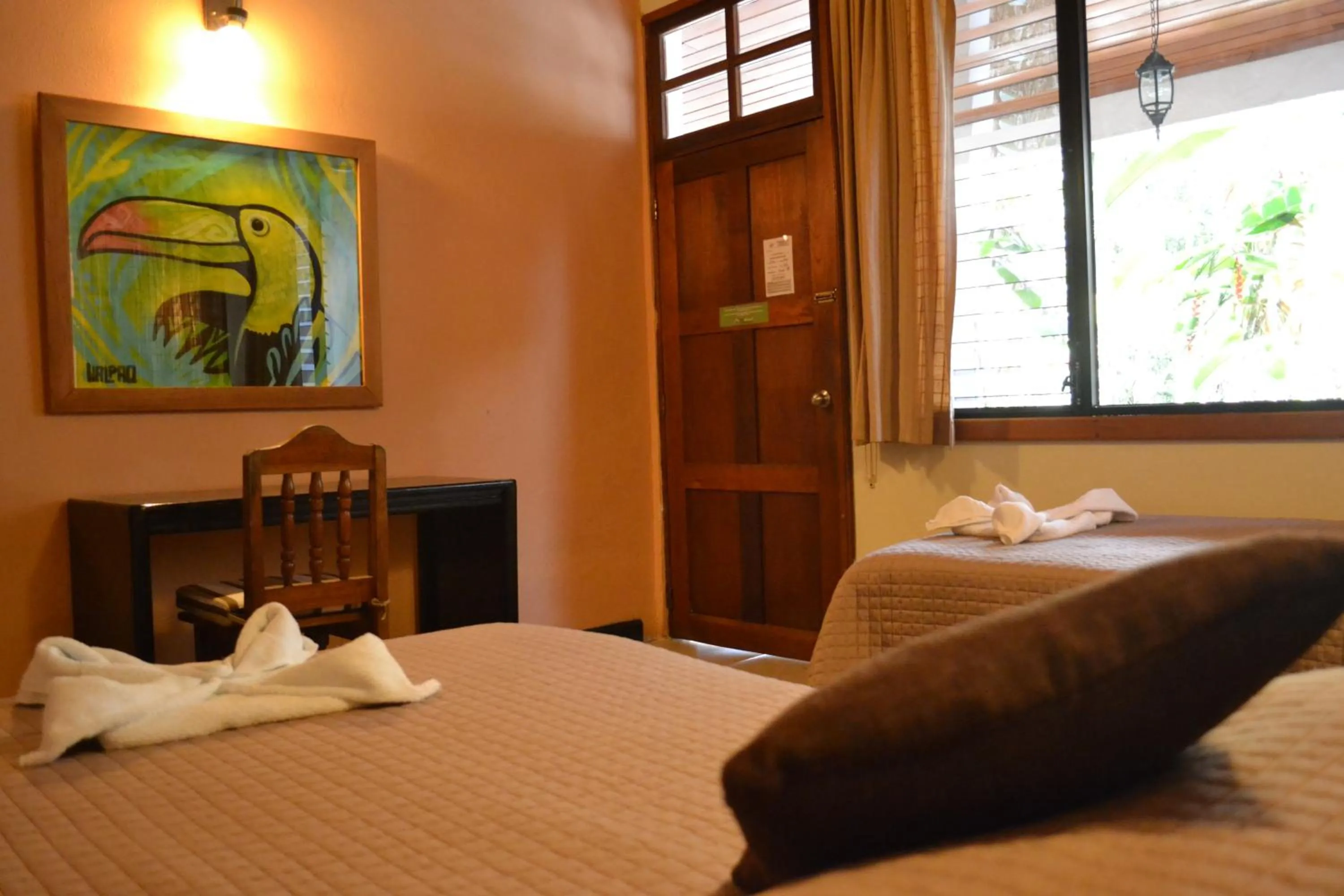 Decorative detail, Bed in Hotel Jaguar Inn Tikal