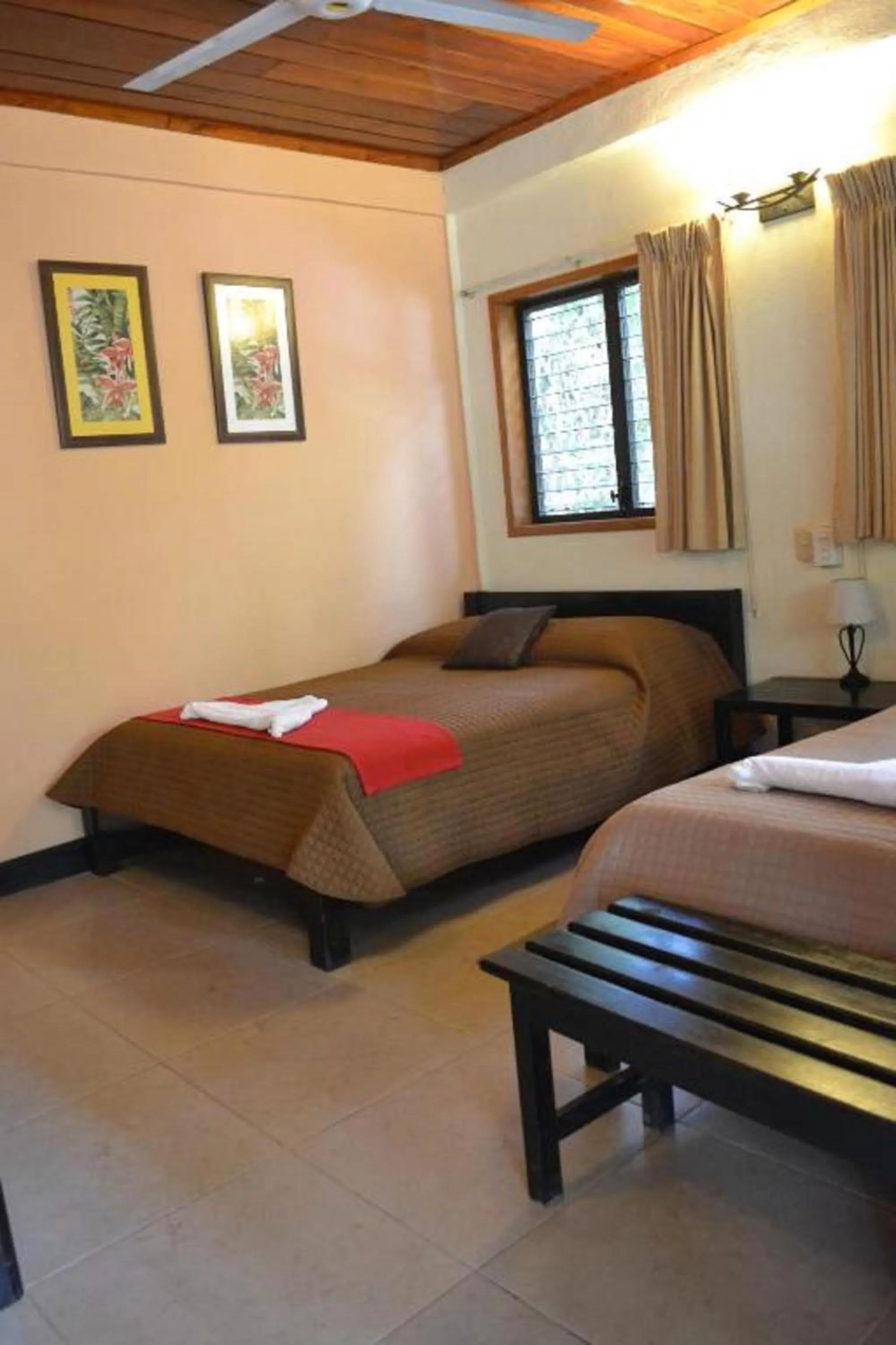 Bed in Hotel Jaguar Inn Tikal