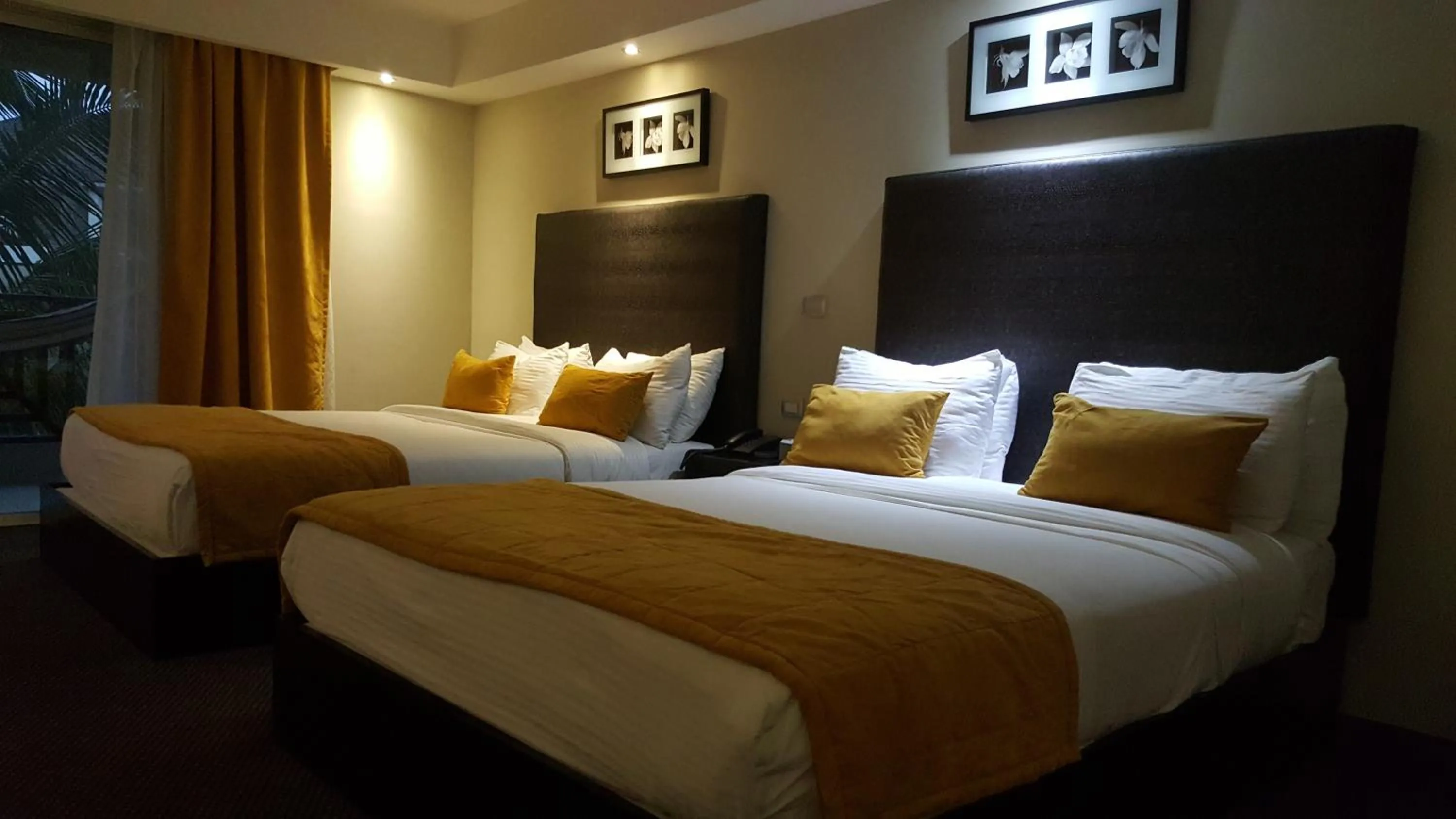 Bed in Savoy Hotel Boutique