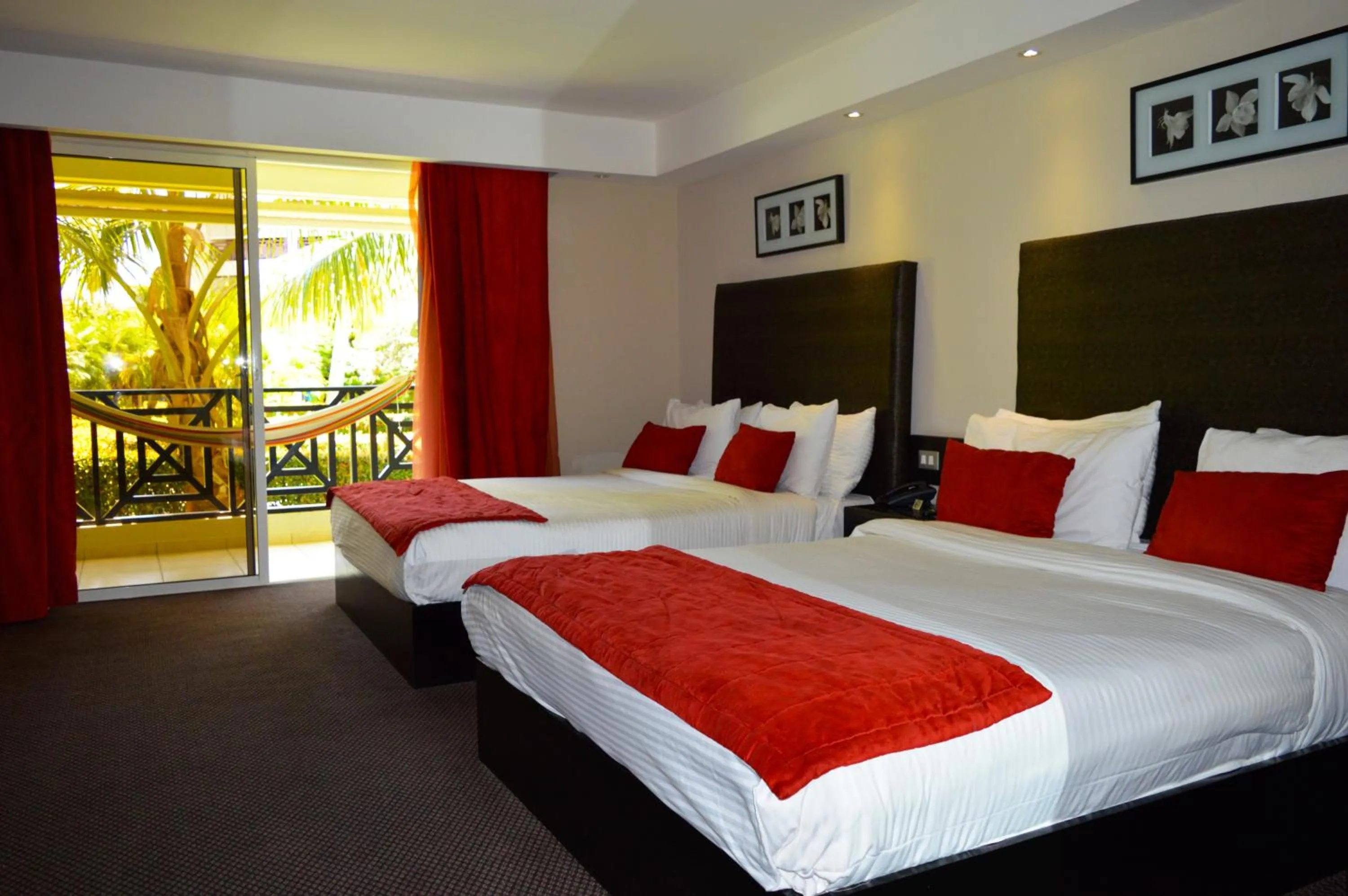 Bed in Savoy Hotel Boutique