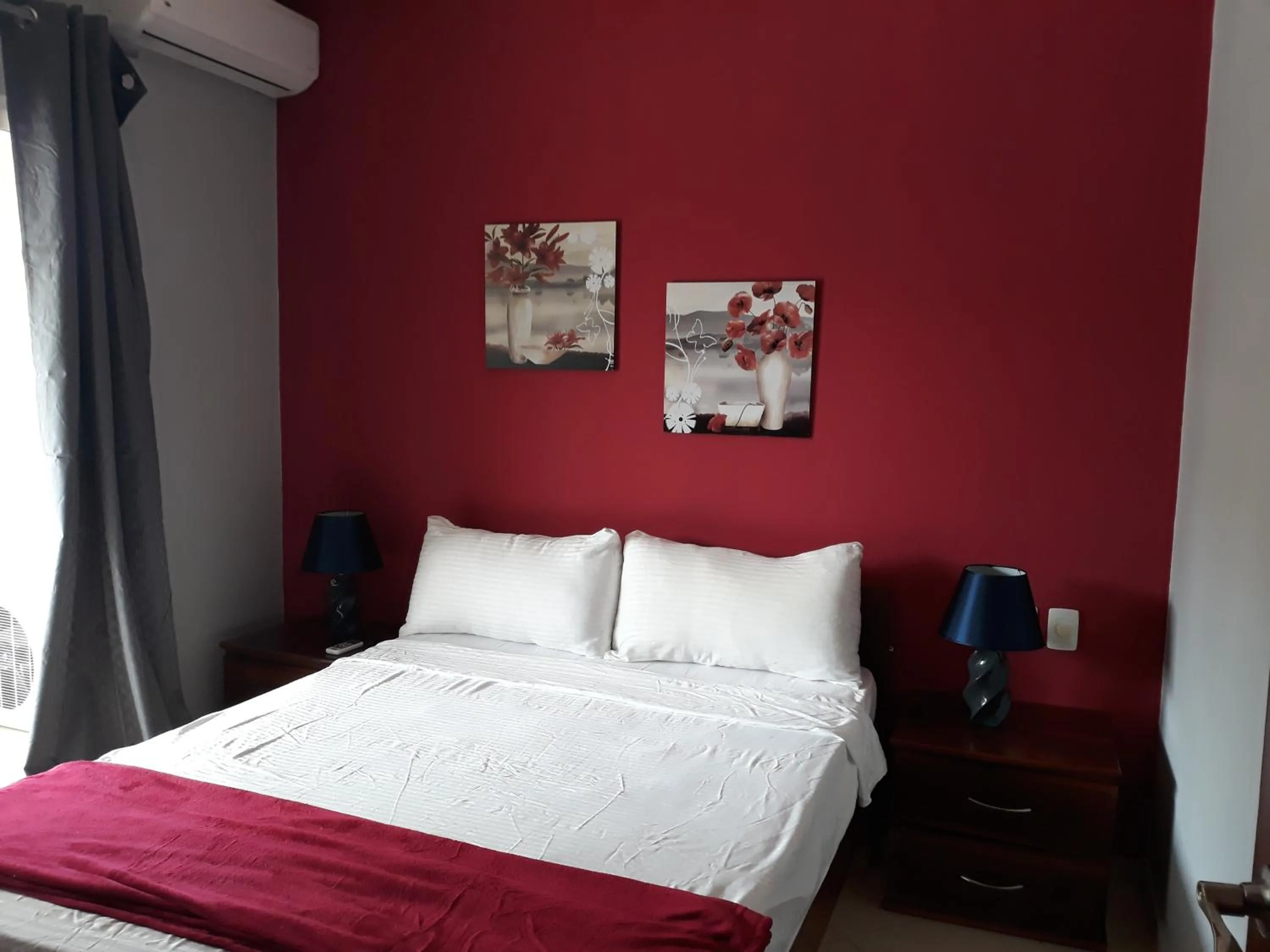 Bed in Savoy Hotel Boutique