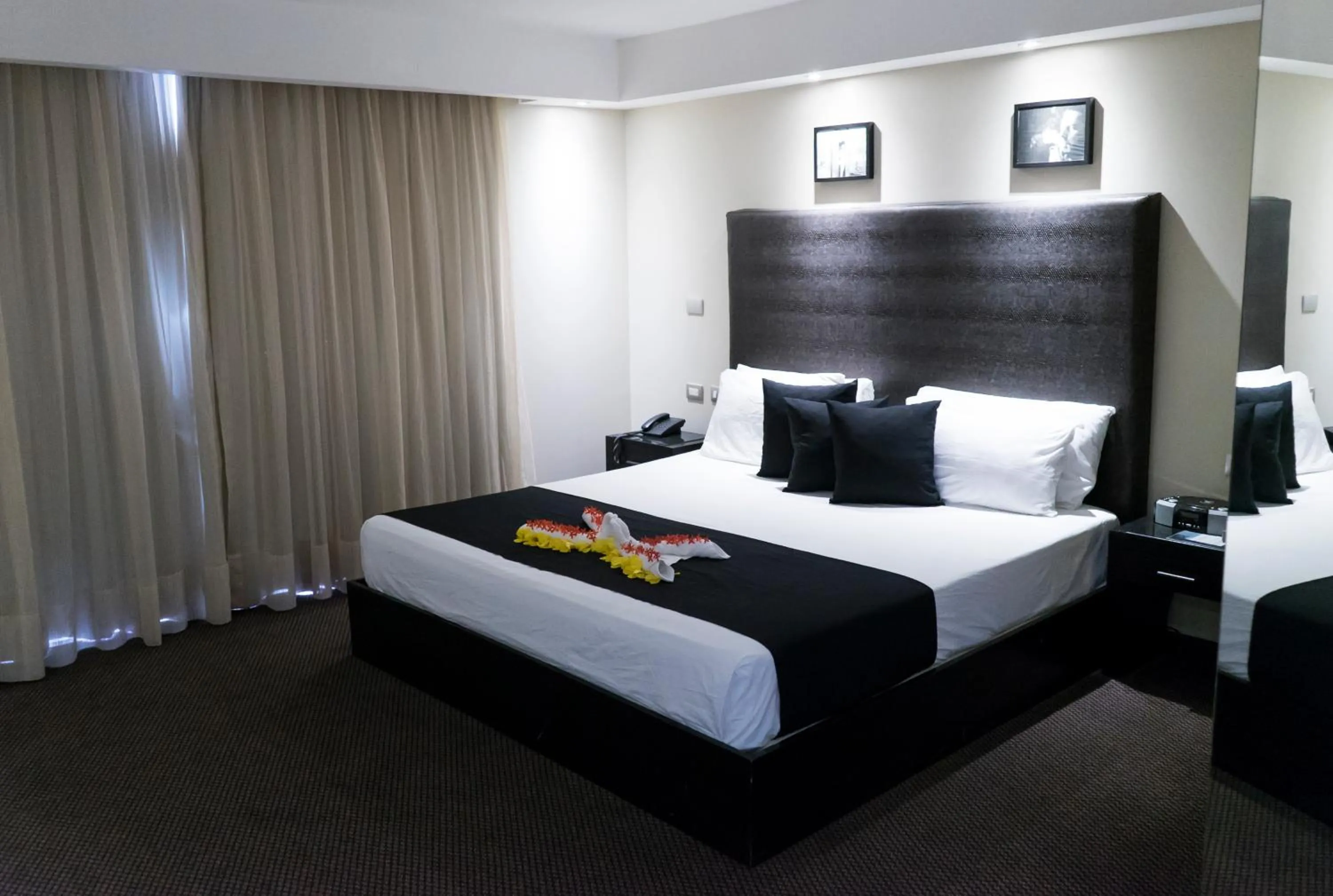 Bed in Savoy Hotel Boutique