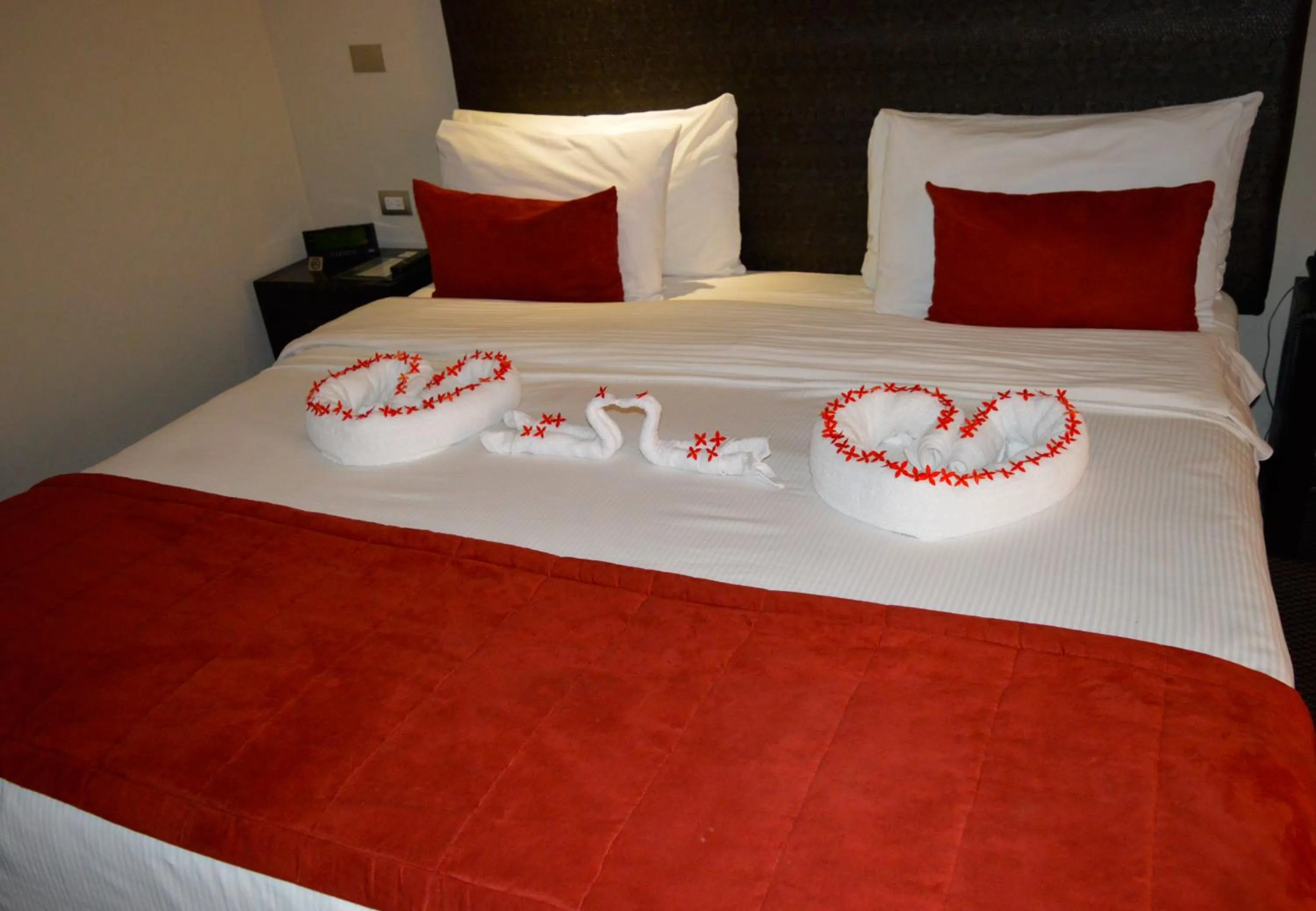 Bed in Savoy Hotel Boutique